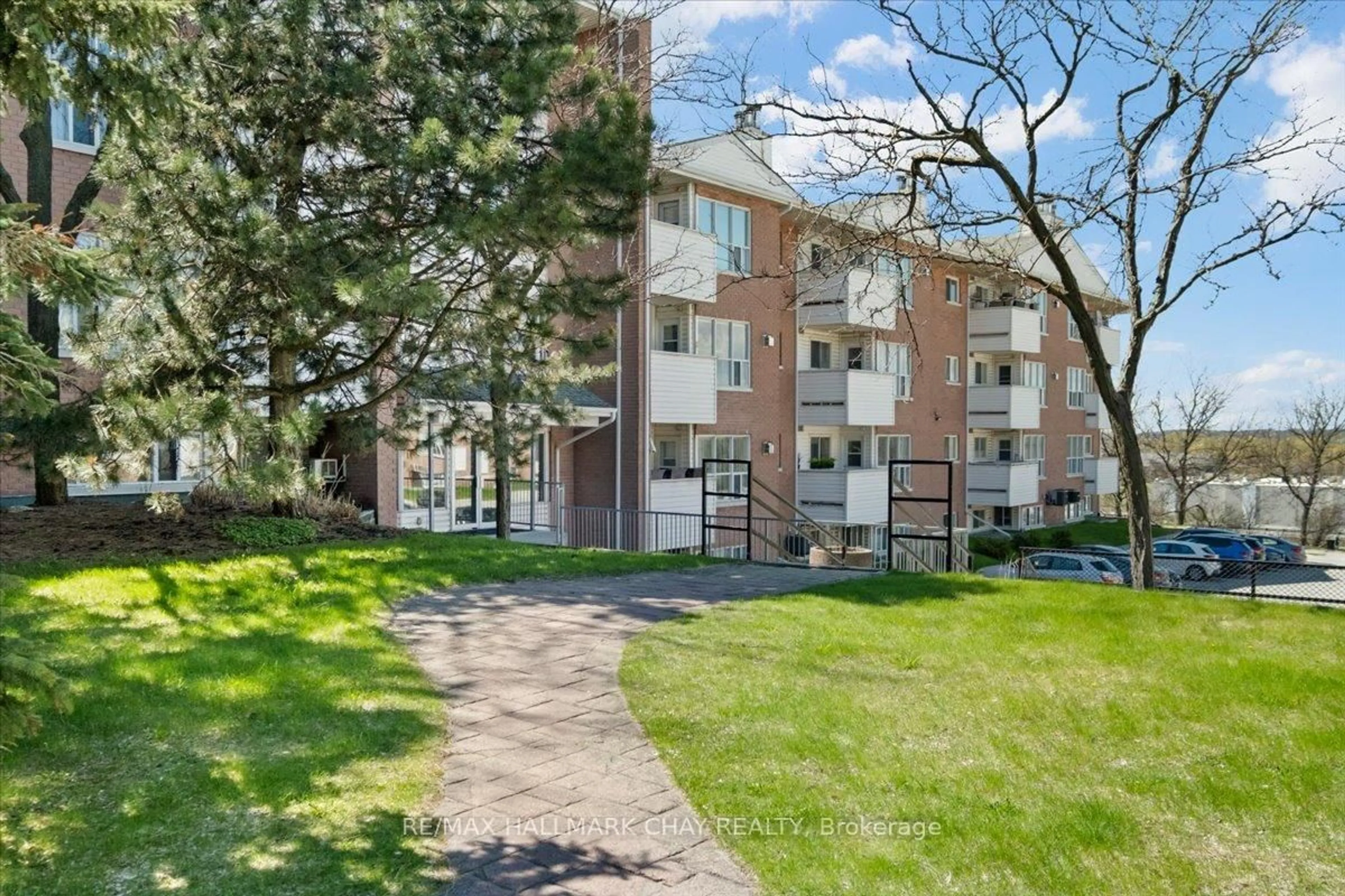 Patio, street for 120 Bell Farm Rd #201, Barrie Ontario L4M 6J2