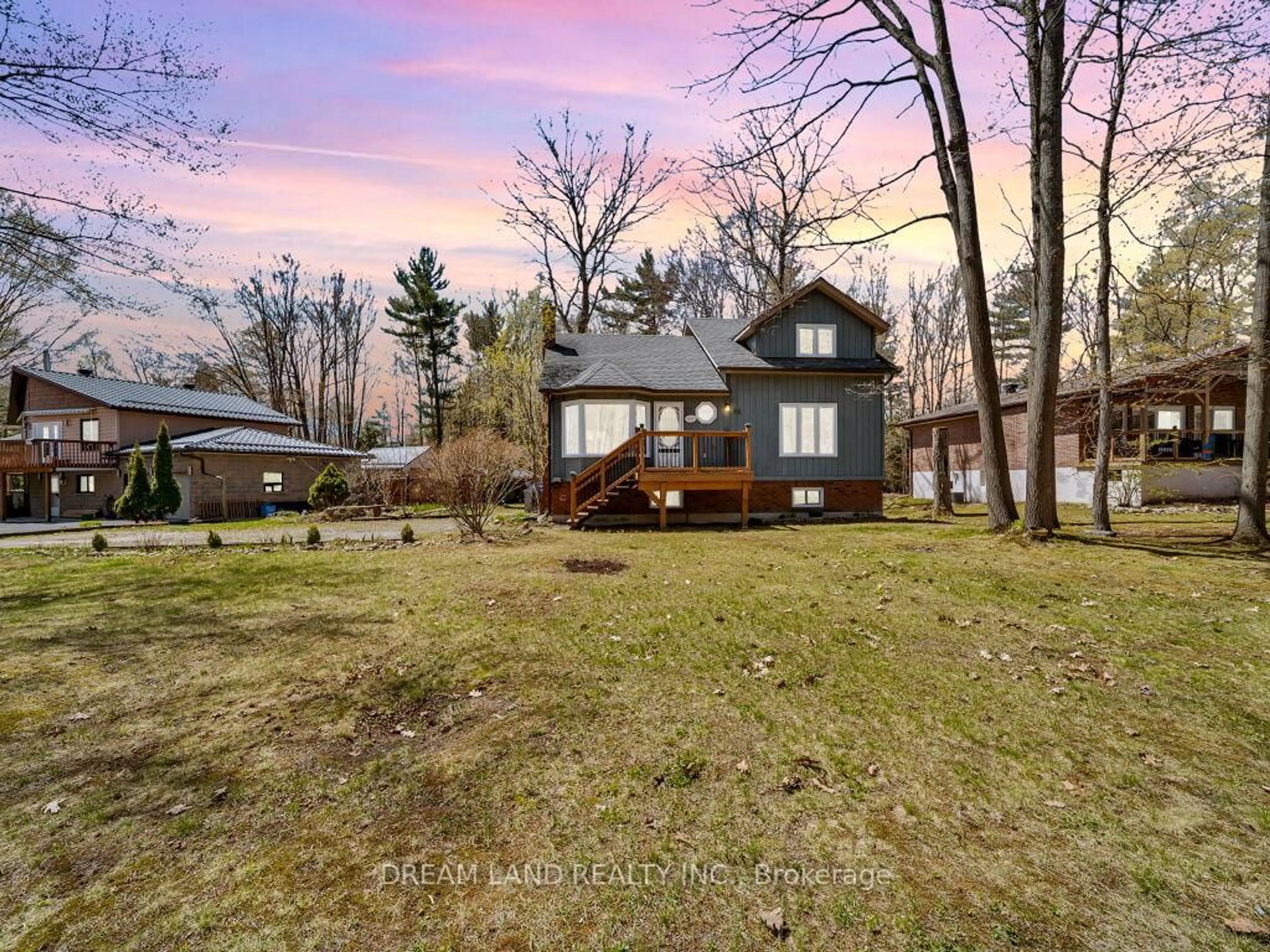 A pic from outside/outdoor area/front of a property/back of a property/a pic from drone, water/lake/river/ocean view for 86 TALL PINES Dr, Tiny Ontario L9M 0H4