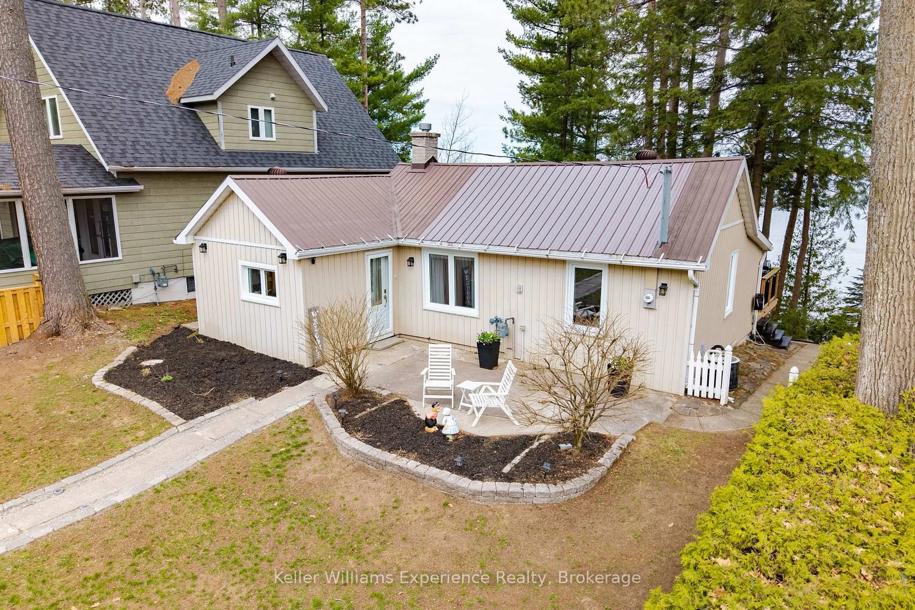 A pic from outside/outdoor area/front of a property/back of a property/a pic from drone, unknown for 2256 South Orr Lake Rd, Springwater Ontario L0L 1P0