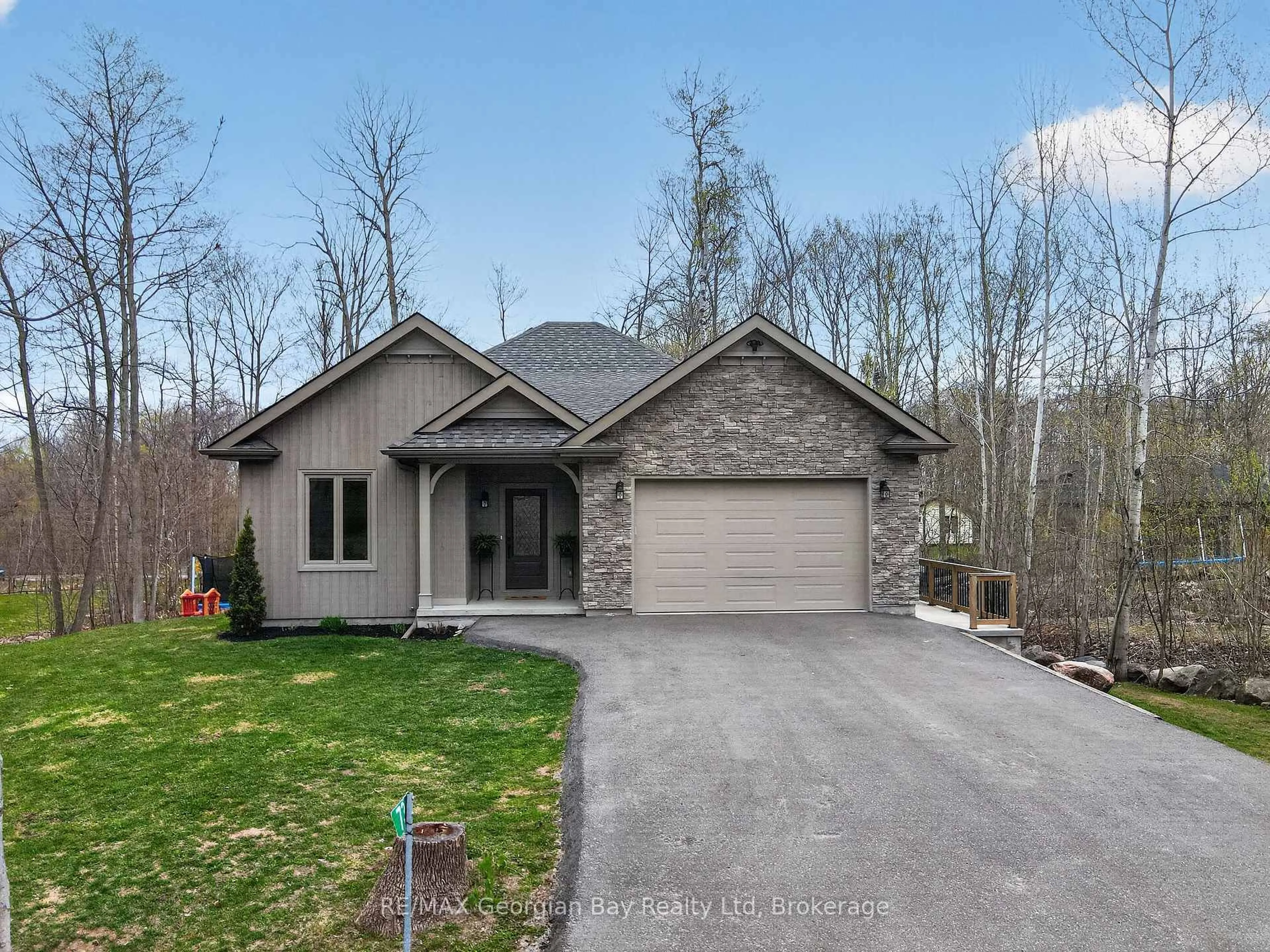 Home with brick exterior material, street for 73 Polish Ave, Penetanguishene Ontario L9M 1W8