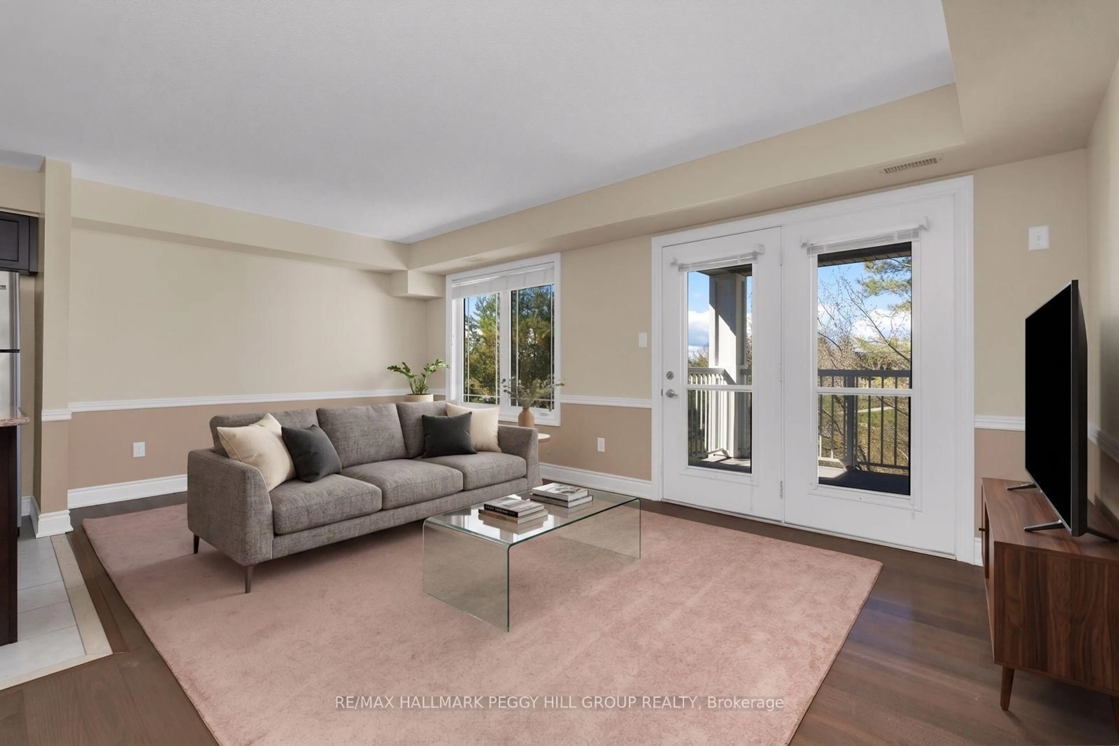 Living room with furniture, unknown for 60 Mulligan Lane #324, Wasaga Beach Ontario L9Z 0C5