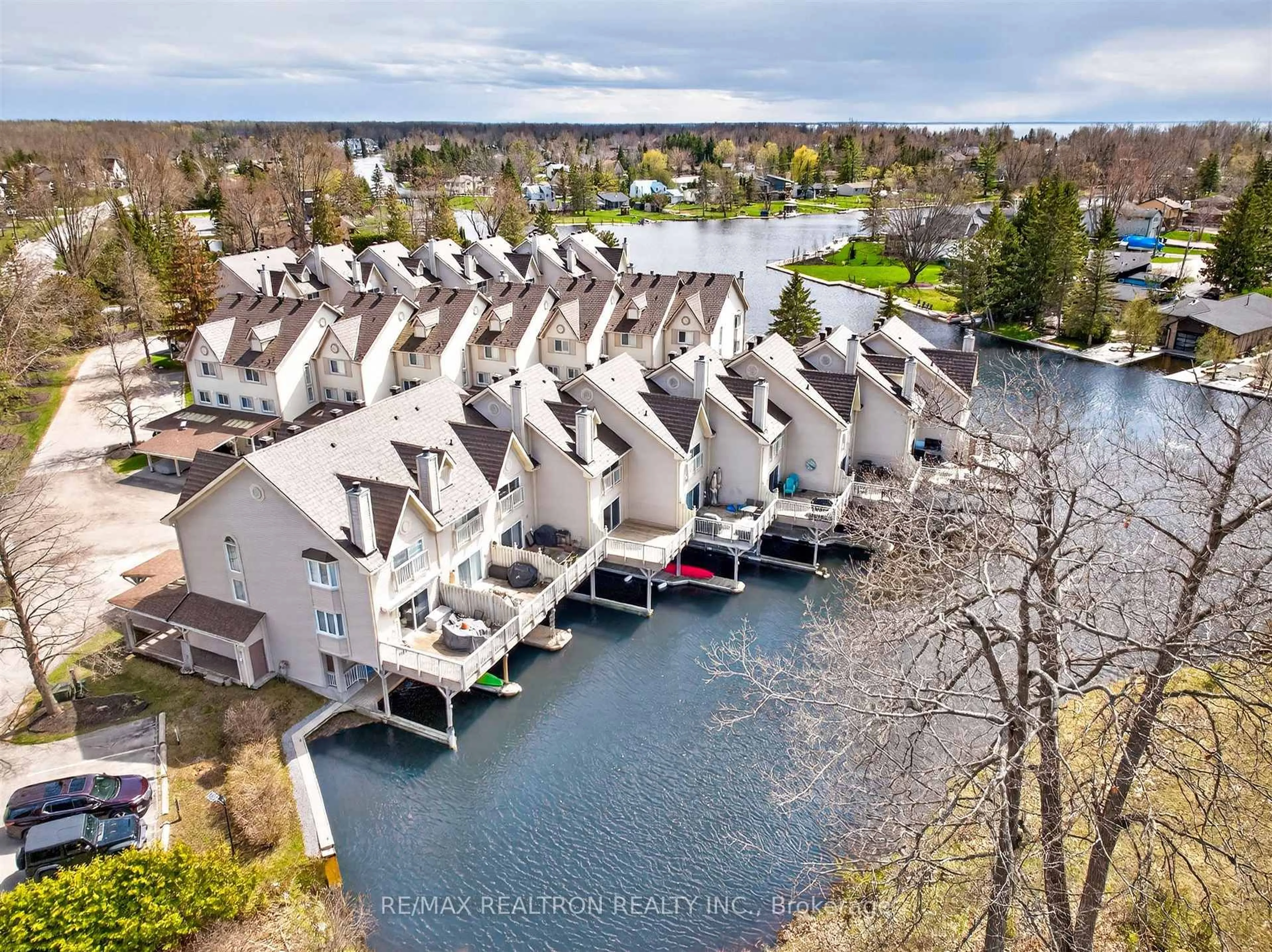 A pic from outside/outdoor area/front of a property/back of a property/a pic from drone, water/lake/river/ocean view for 100 Laguna Pkwy #22, Ramara Ontario L0K 1B0