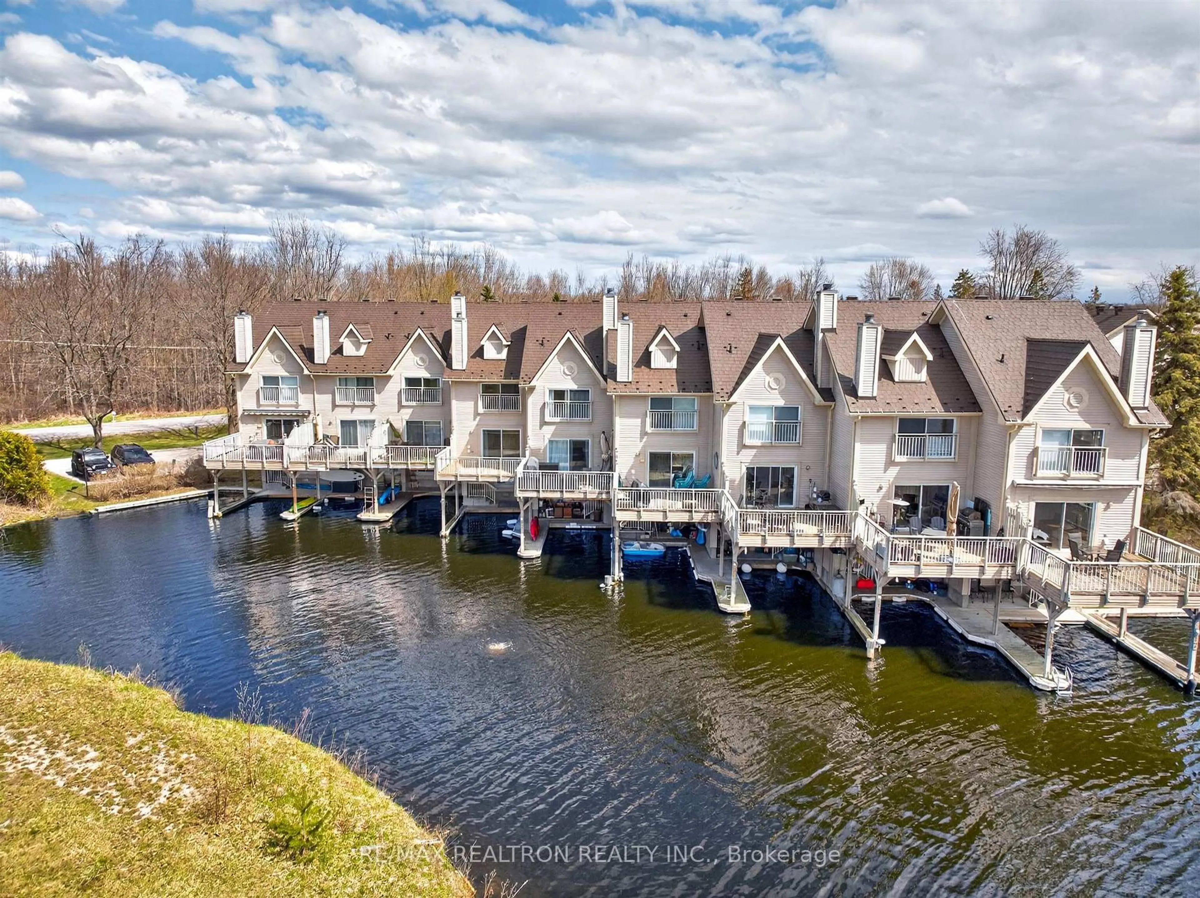 A pic from outside/outdoor area/front of a property/back of a property/a pic from drone, water/lake/river/ocean view for 100 Laguna Pkwy #22, Ramara Ontario L0K 1B0