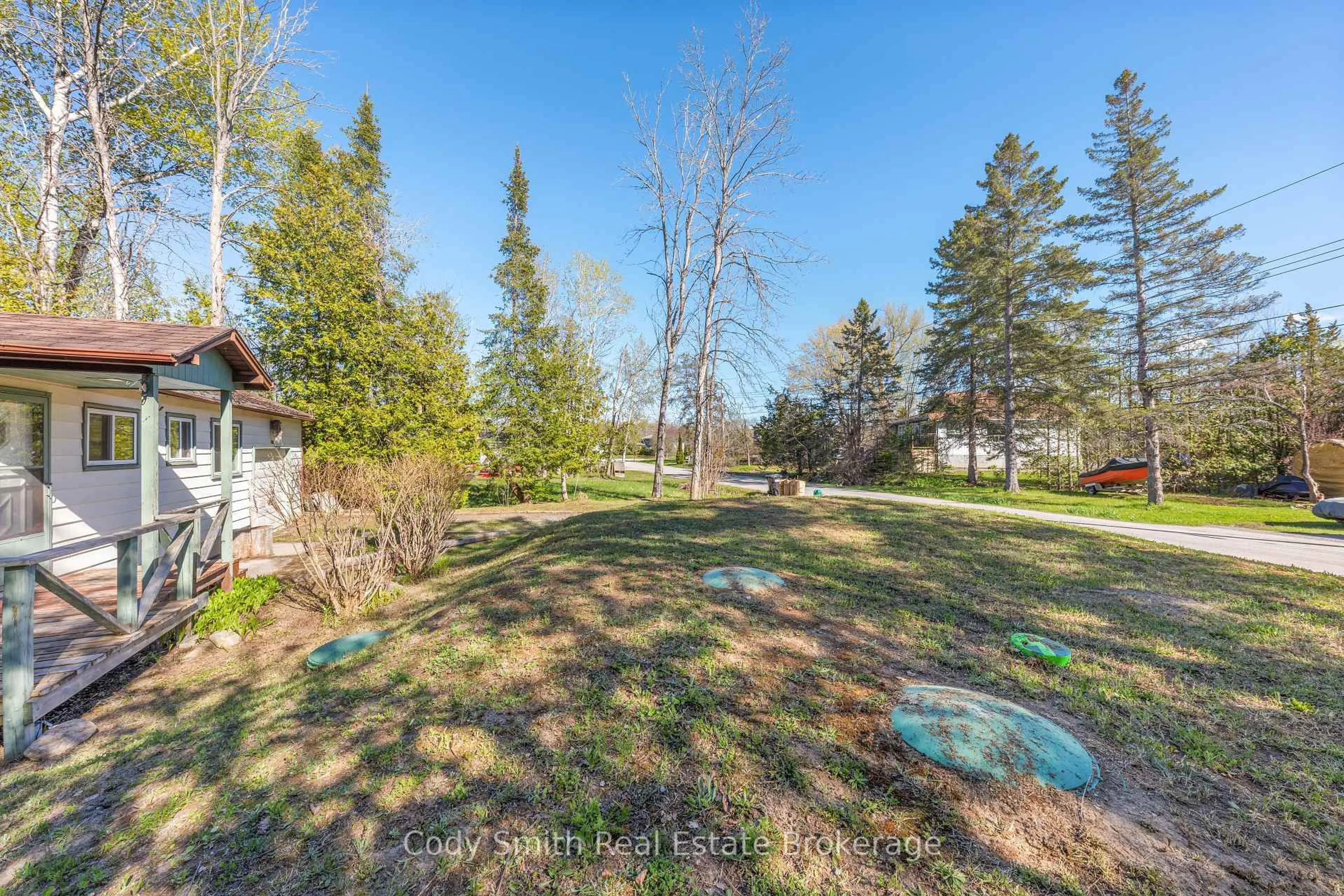 A pic from outside/outdoor area/front of a property/back of a property/a pic from drone, forest/trees view for 183 Paradise Ave, Tay Ontario L0K 1R0