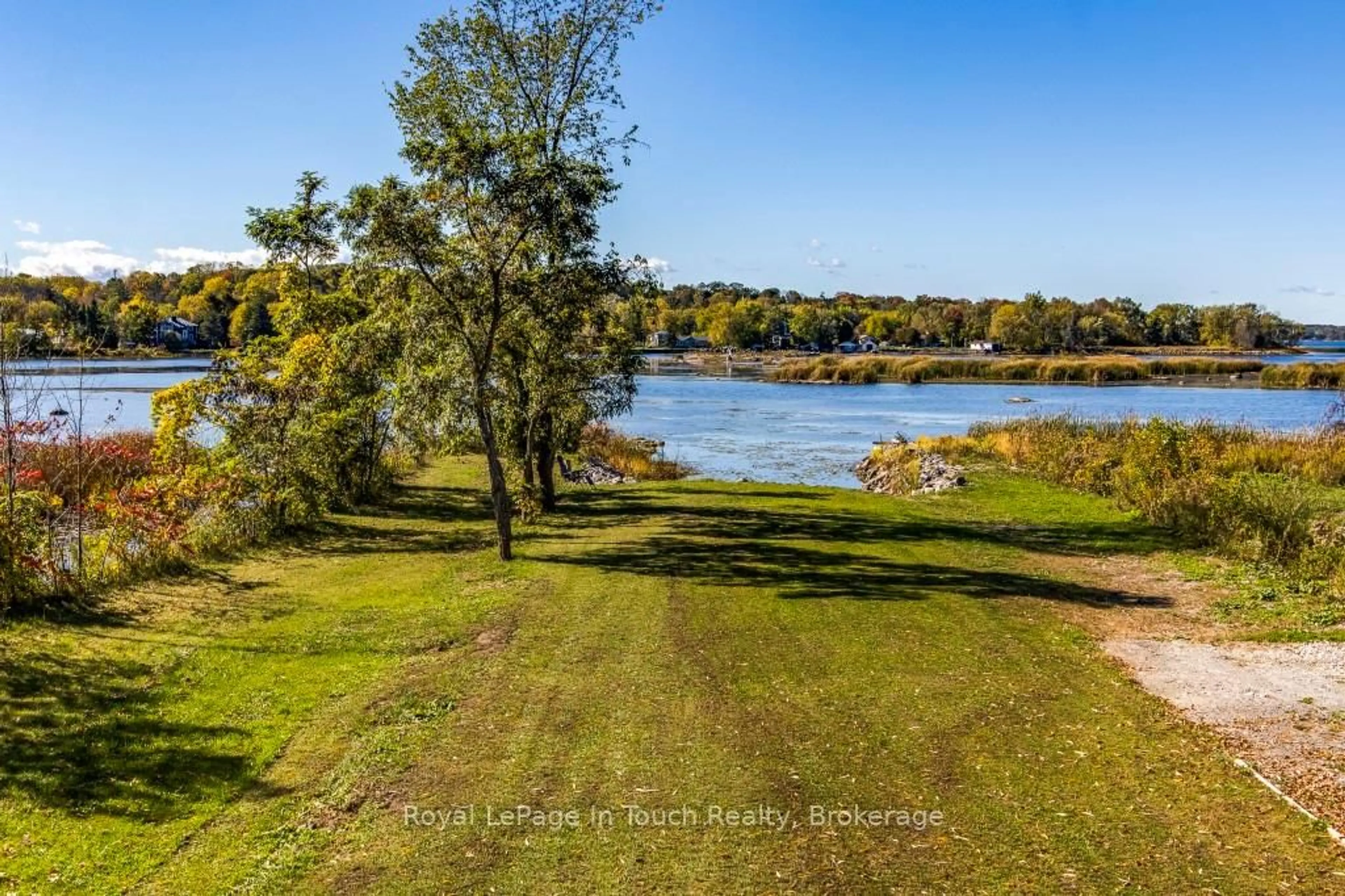 A pic from outside/outdoor area/front of a property/back of a property/a pic from drone, water/lake/river/ocean view for 142 Duck Bay Rd, Tay Ontario L0K 2C0