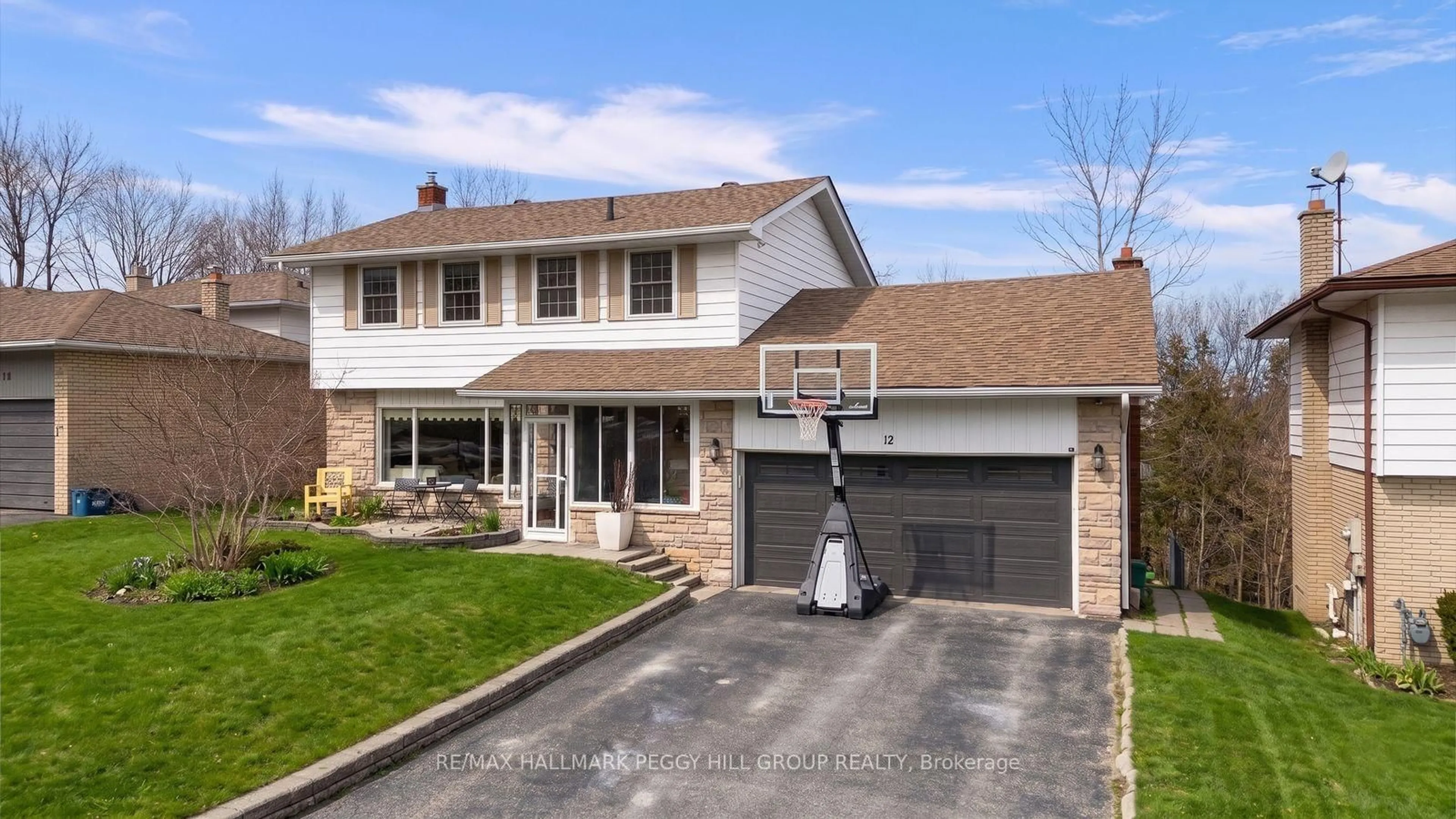 Home with vinyl exterior material, street for 12 Peacock Lane, Barrie Ontario L4N 3R5