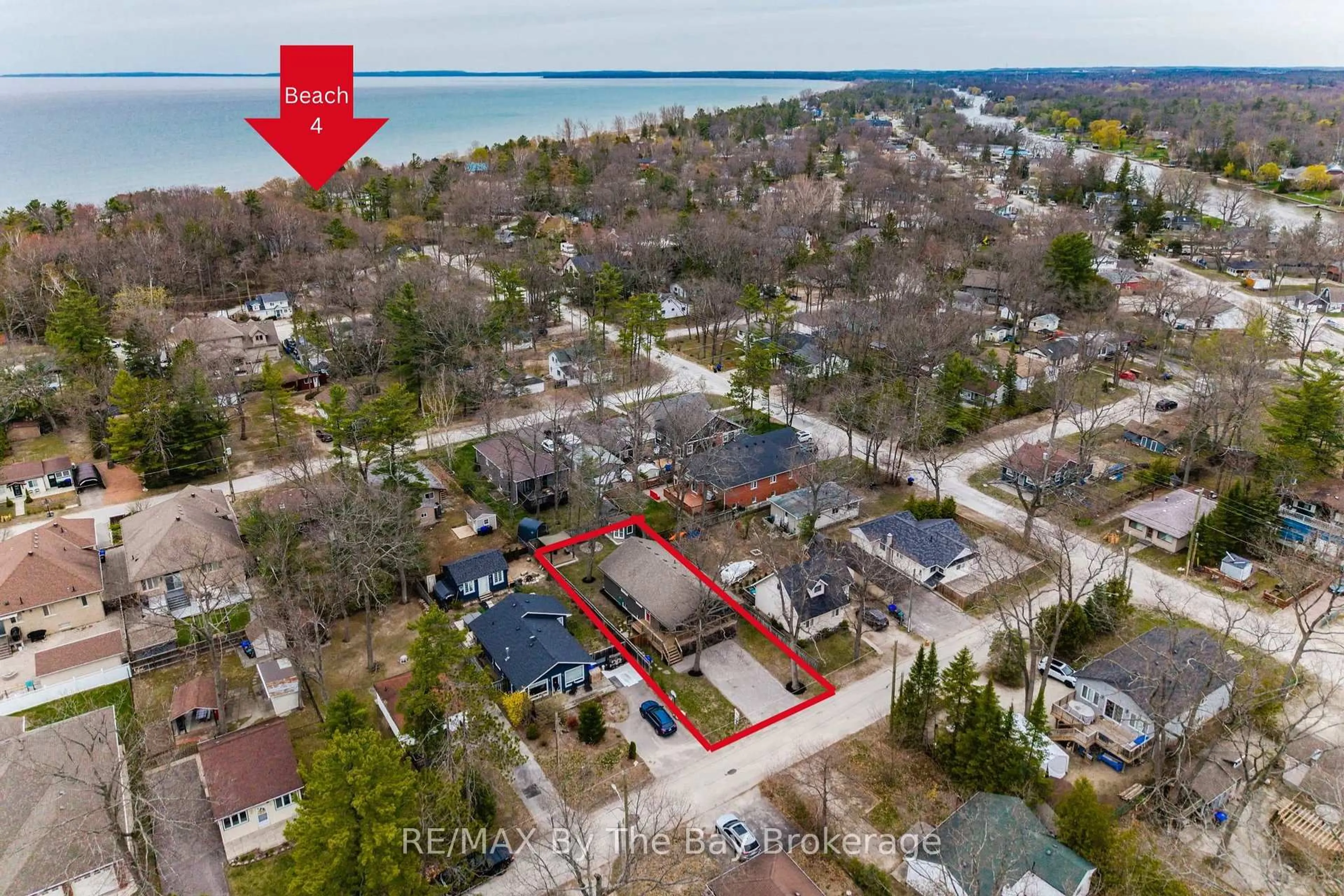 A pic from outside/outdoor area/front of a property/back of a property/a pic from drone, street for 12 5th Lane, Wasaga Beach Ontario L9Z 2E9