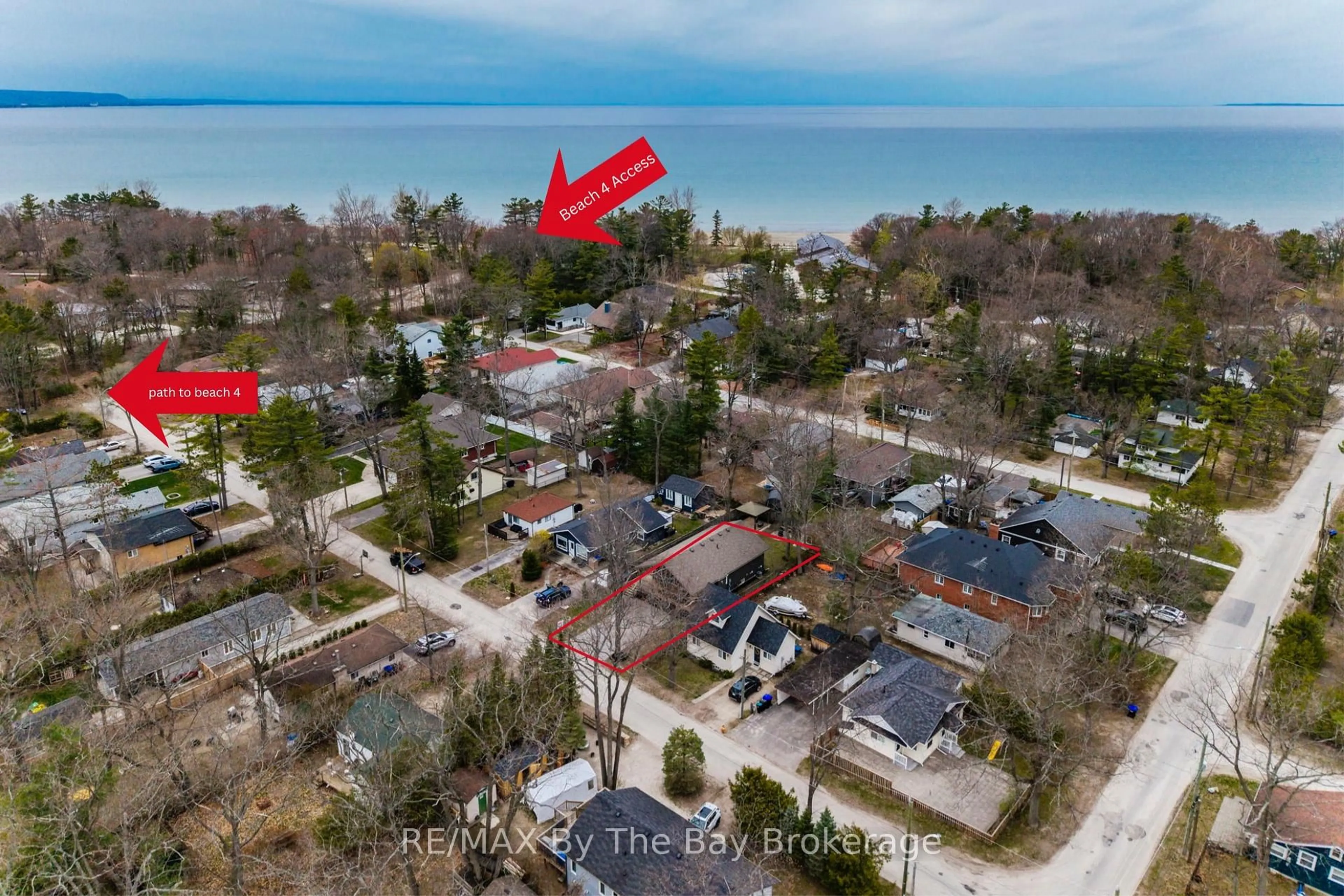 A pic from outside/outdoor area/front of a property/back of a property/a pic from drone, water/lake/river/ocean view for 12 5th Lane, Wasaga Beach Ontario L9Z 2E9