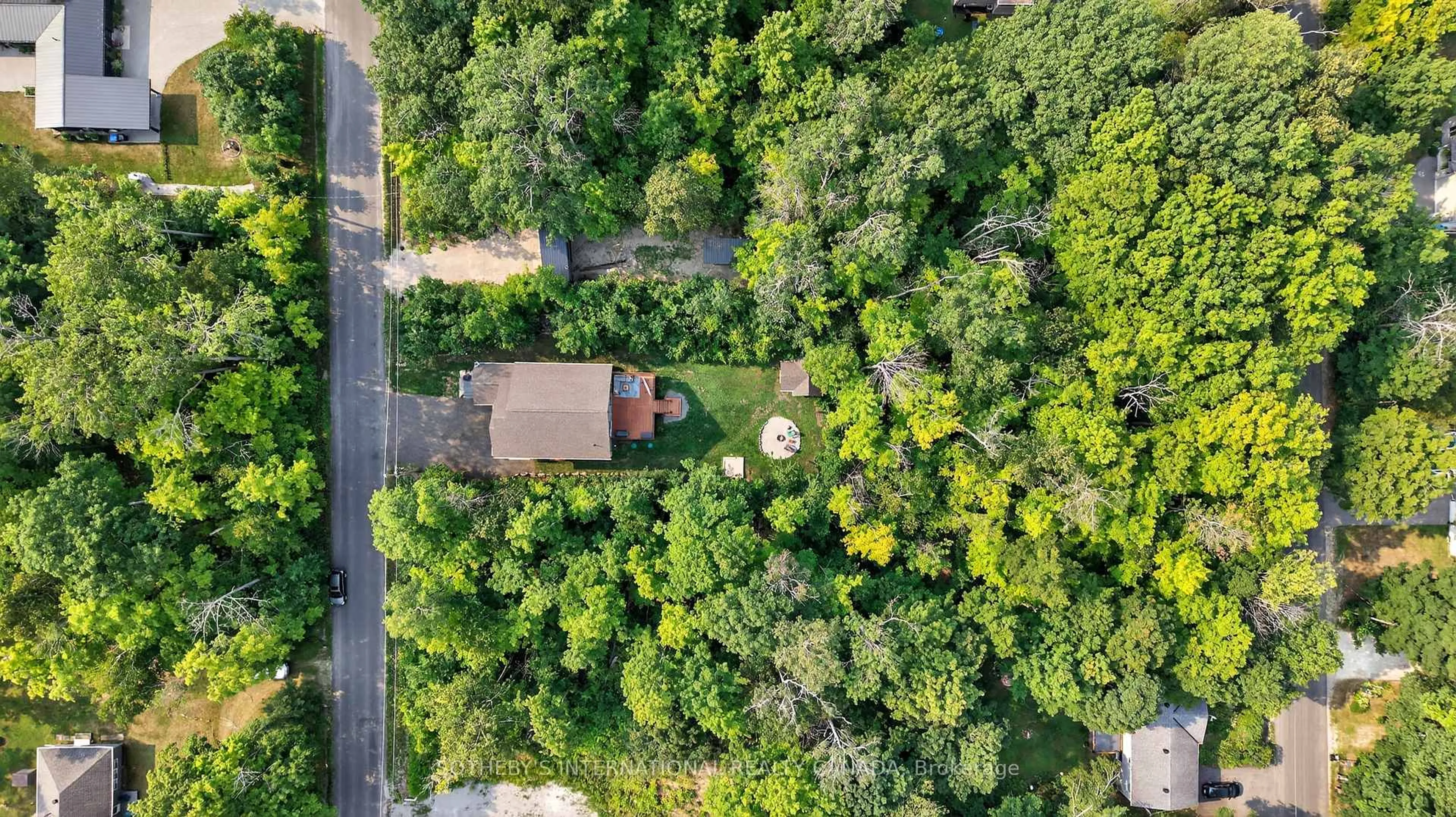 A pic from outside/outdoor area/front of a property/back of a property/a pic from drone, forest/trees view for 73 Wozniak Rd, Penetanguishene Ontario L9M 1W6