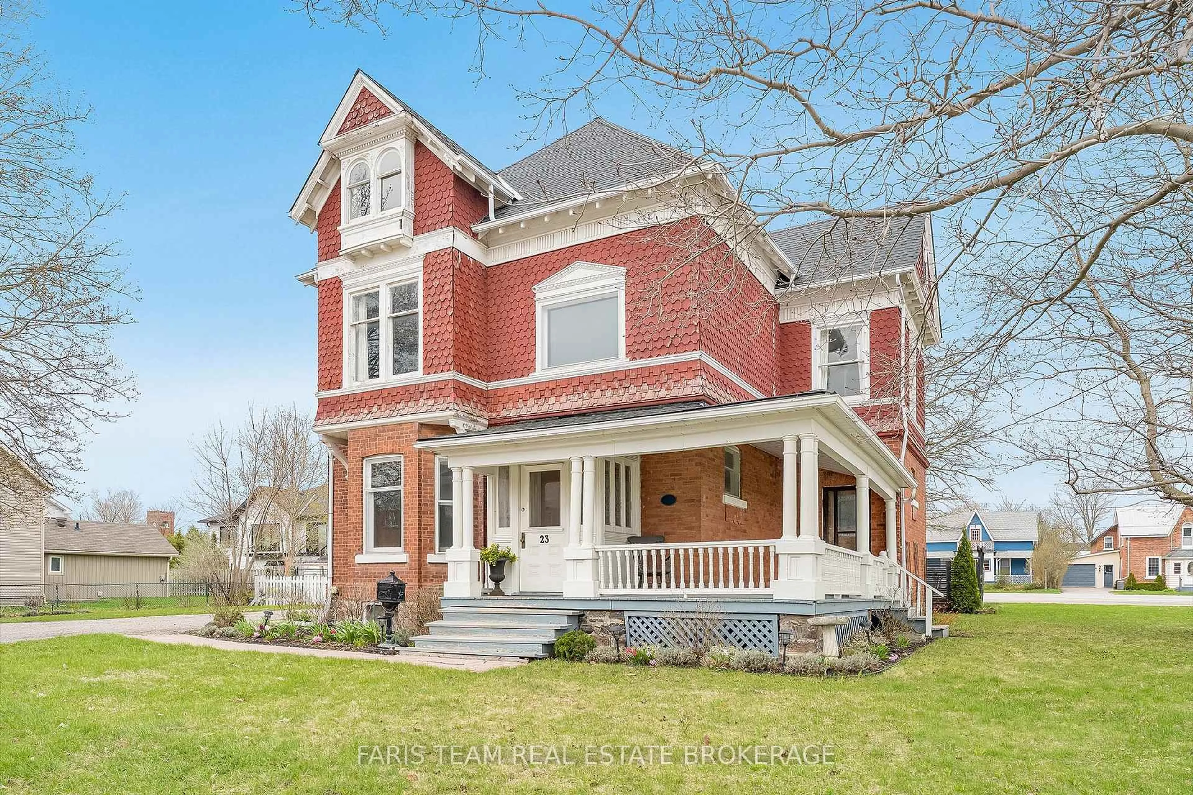 Home with brick exterior material, street for 23 Yonge St, Springwater Ontario L0L 1P0