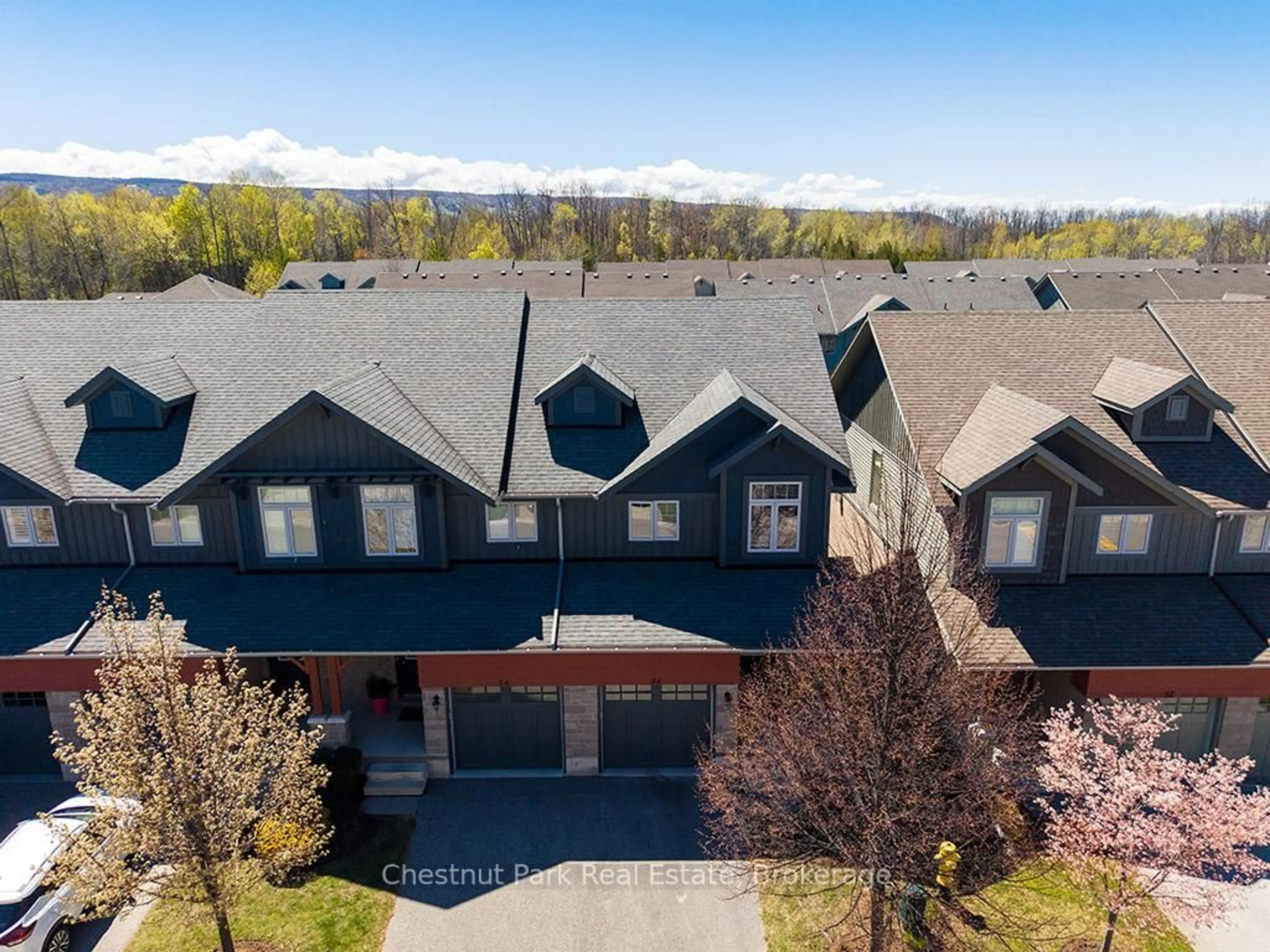 A pic from outside/outdoor area/front of a property/back of a property/a pic from drone, mountain view for 54 Conservation Way, Collingwood Ontario L9Y 0G9