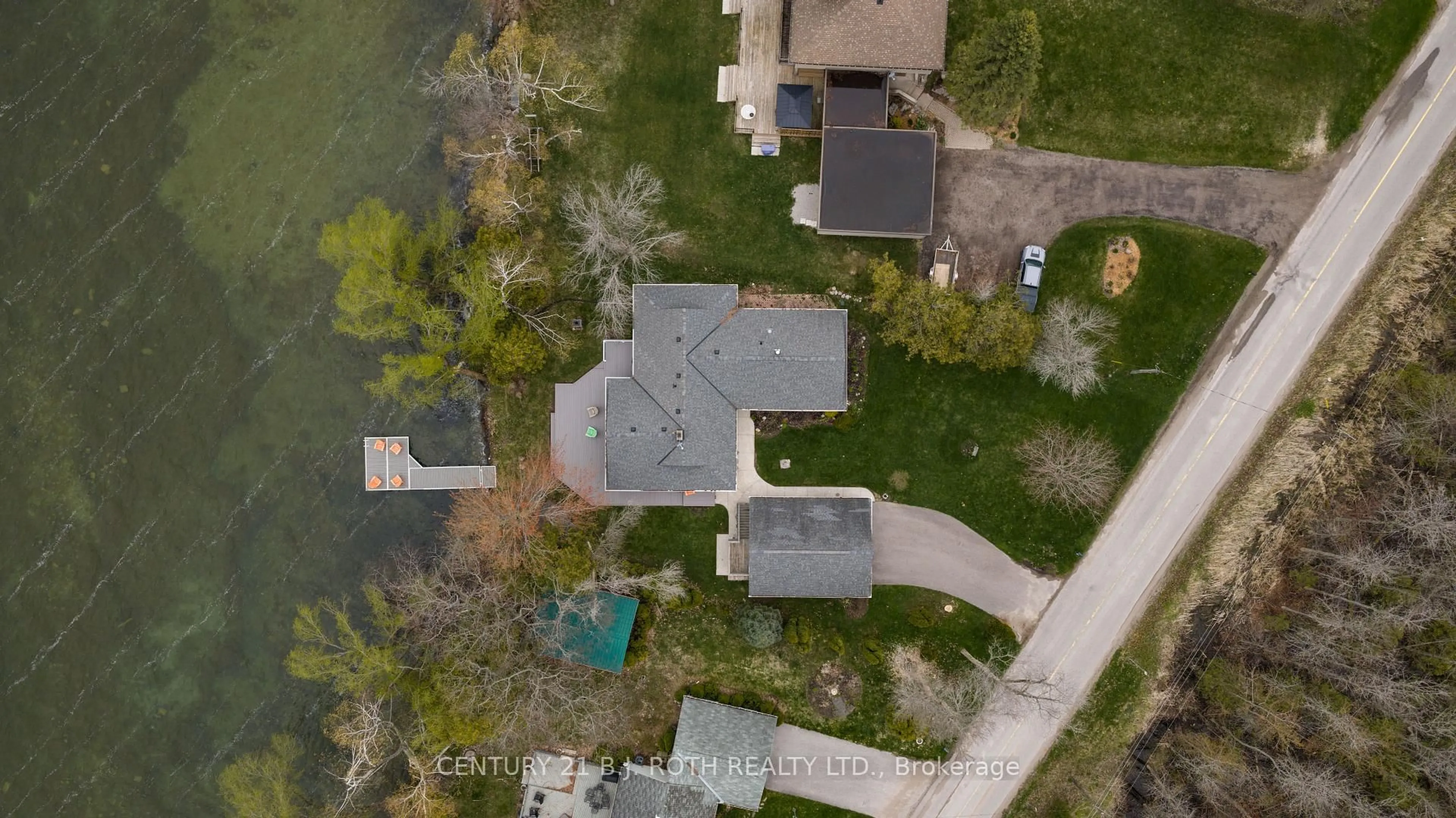 A pic from outside/outdoor area/front of a property/back of a property/a pic from drone, water/lake/river/ocean view for 4486 Fern Resort Rd, Ramara Ontario L3V 0Z1