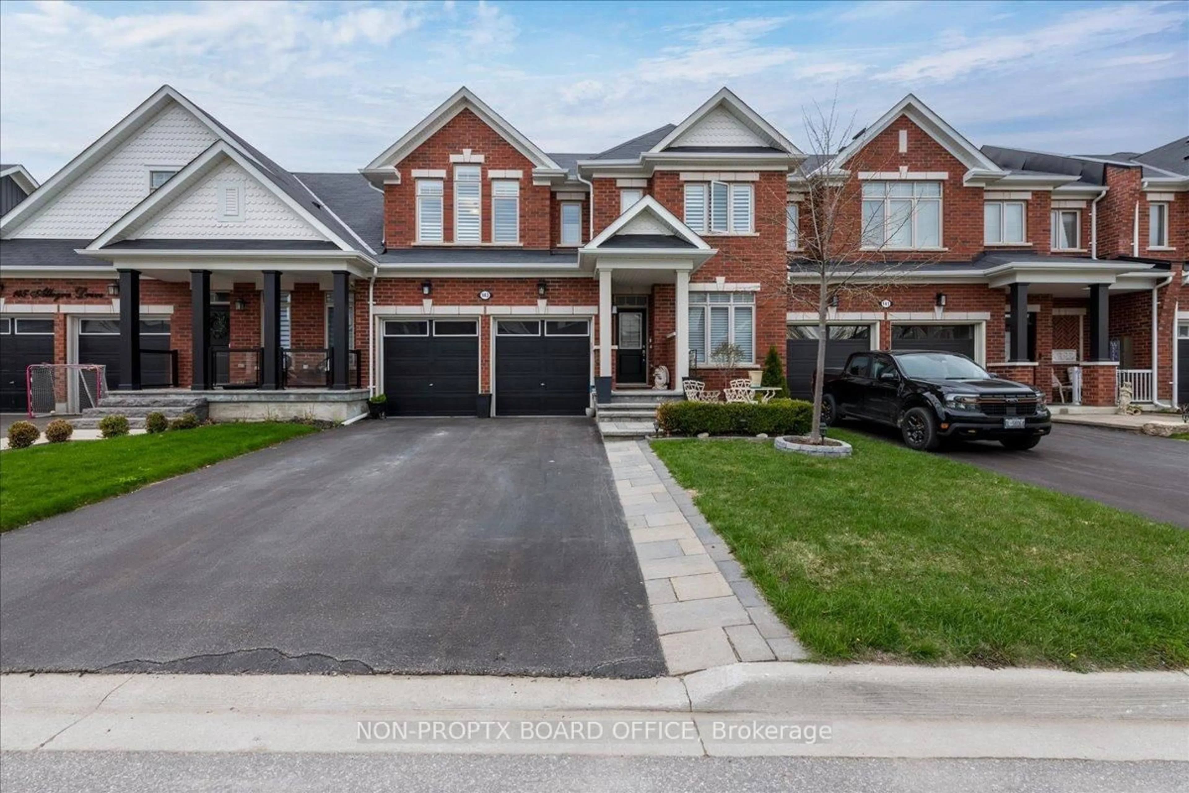 Home with brick exterior material, street for 143 Allegra Dr, Wasaga Beach Ontario L9Z 0H6