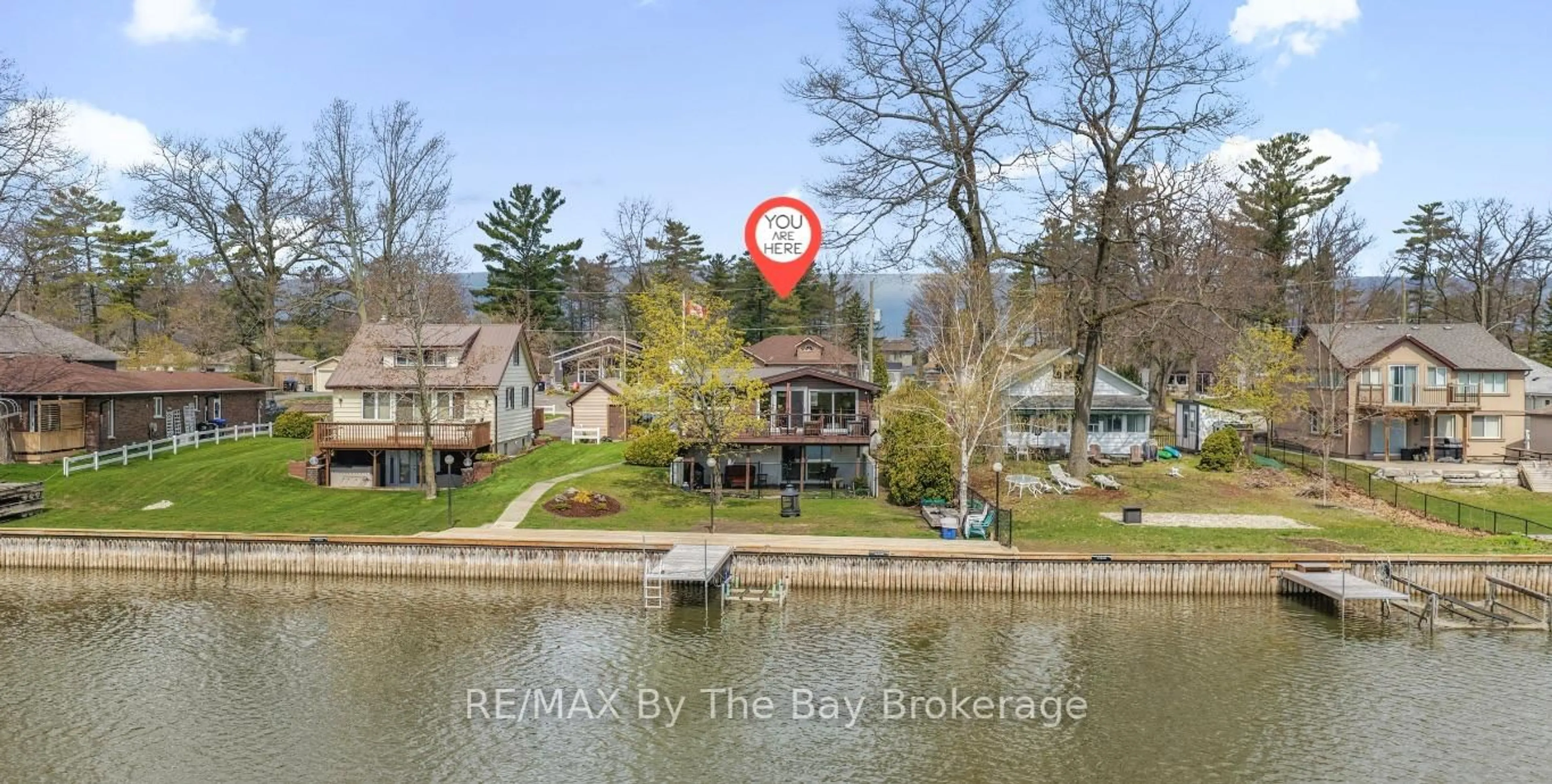A pic from outside/outdoor area/front of a property/back of a property/a pic from drone, water/lake/river/ocean view for 39 Old Mosley St, Wasaga Beach Ontario L9Z 2J8