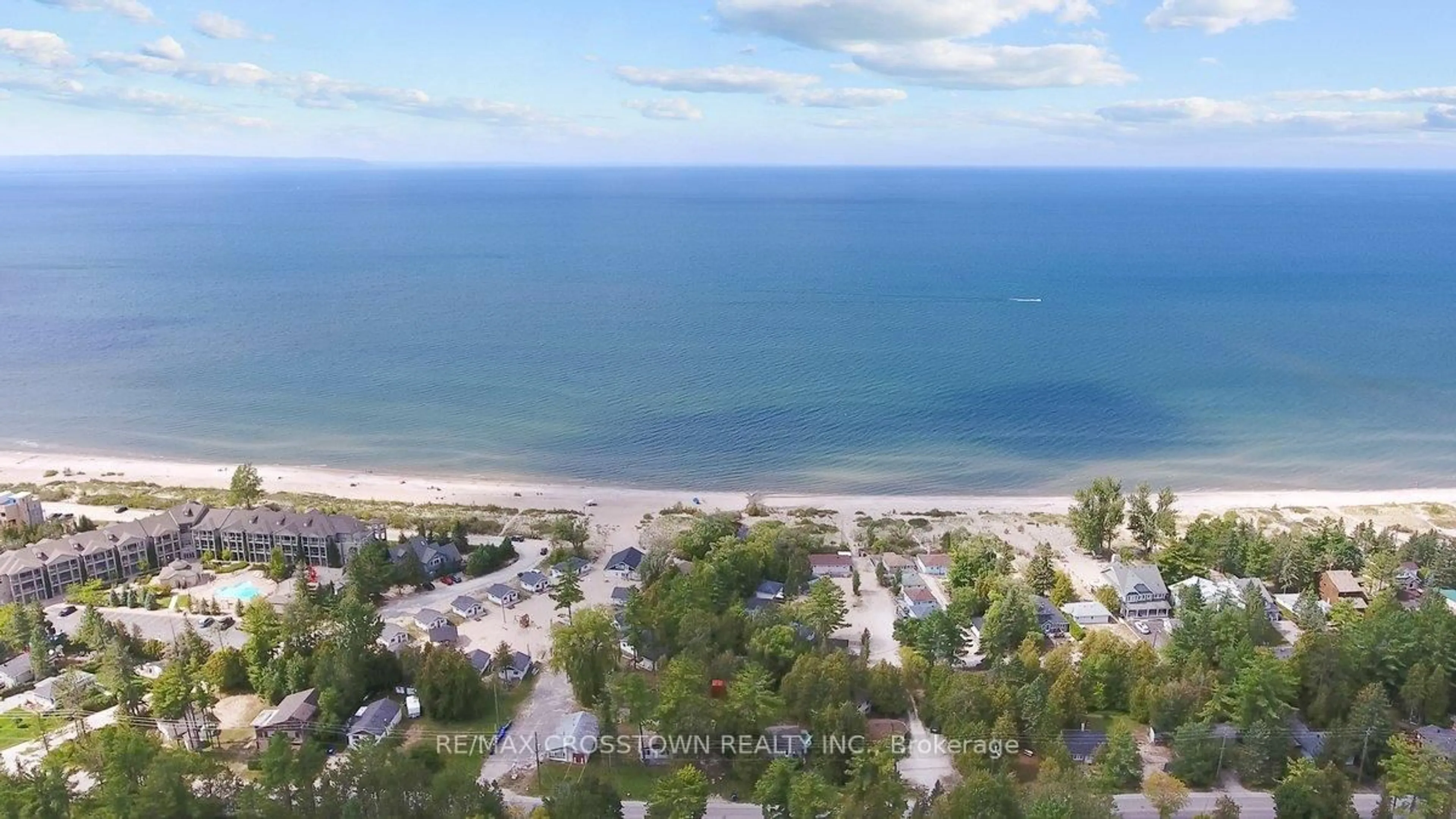 A pic from outside/outdoor area/front of a property/back of a property/a pic from drone, water/lake/river/ocean view for 61 Earl St, Wasaga Beach Ontario L9Z 2M6