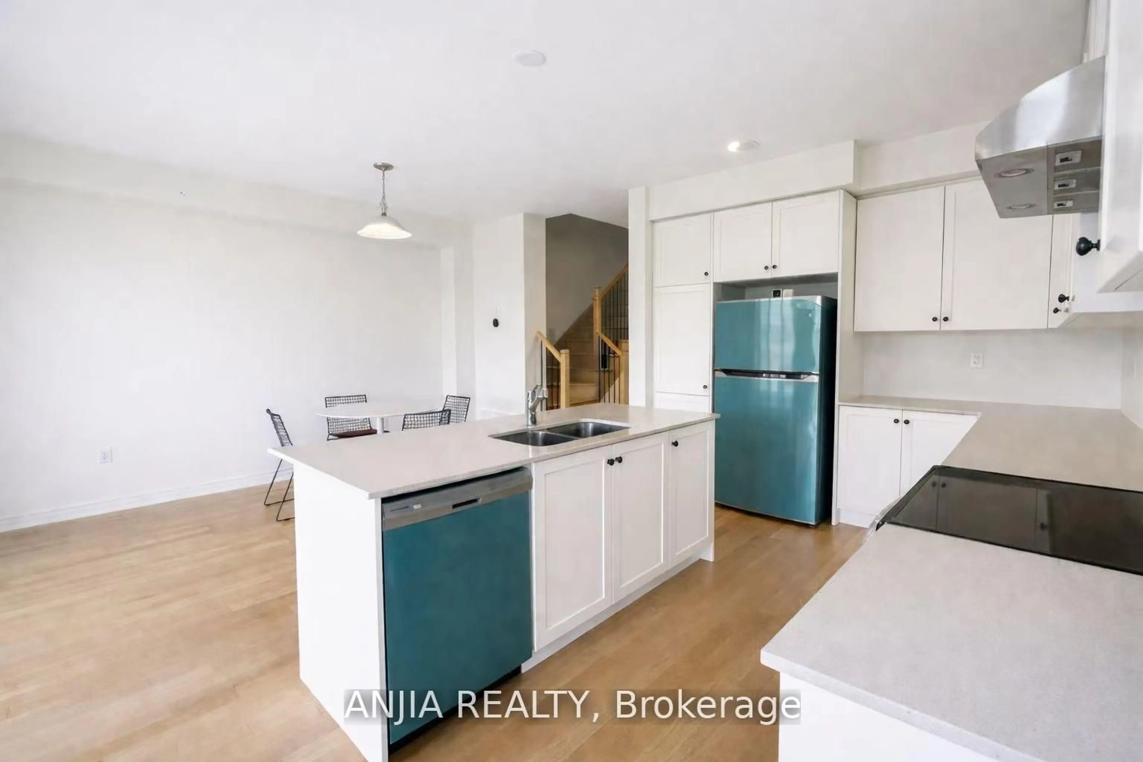 Open concept kitchen, wood/laminate floor for 65 Greer St, Barrie Ontario L9J 0R5