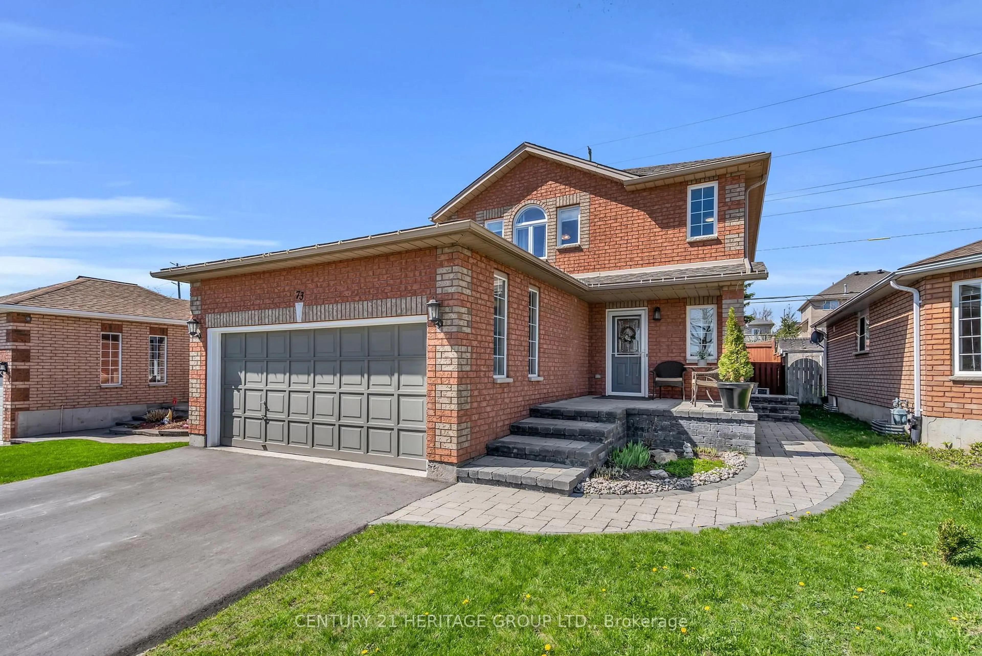 Home with brick exterior material, street for 73 Stollar Blvd, Barrie Ontario L4M 6N3