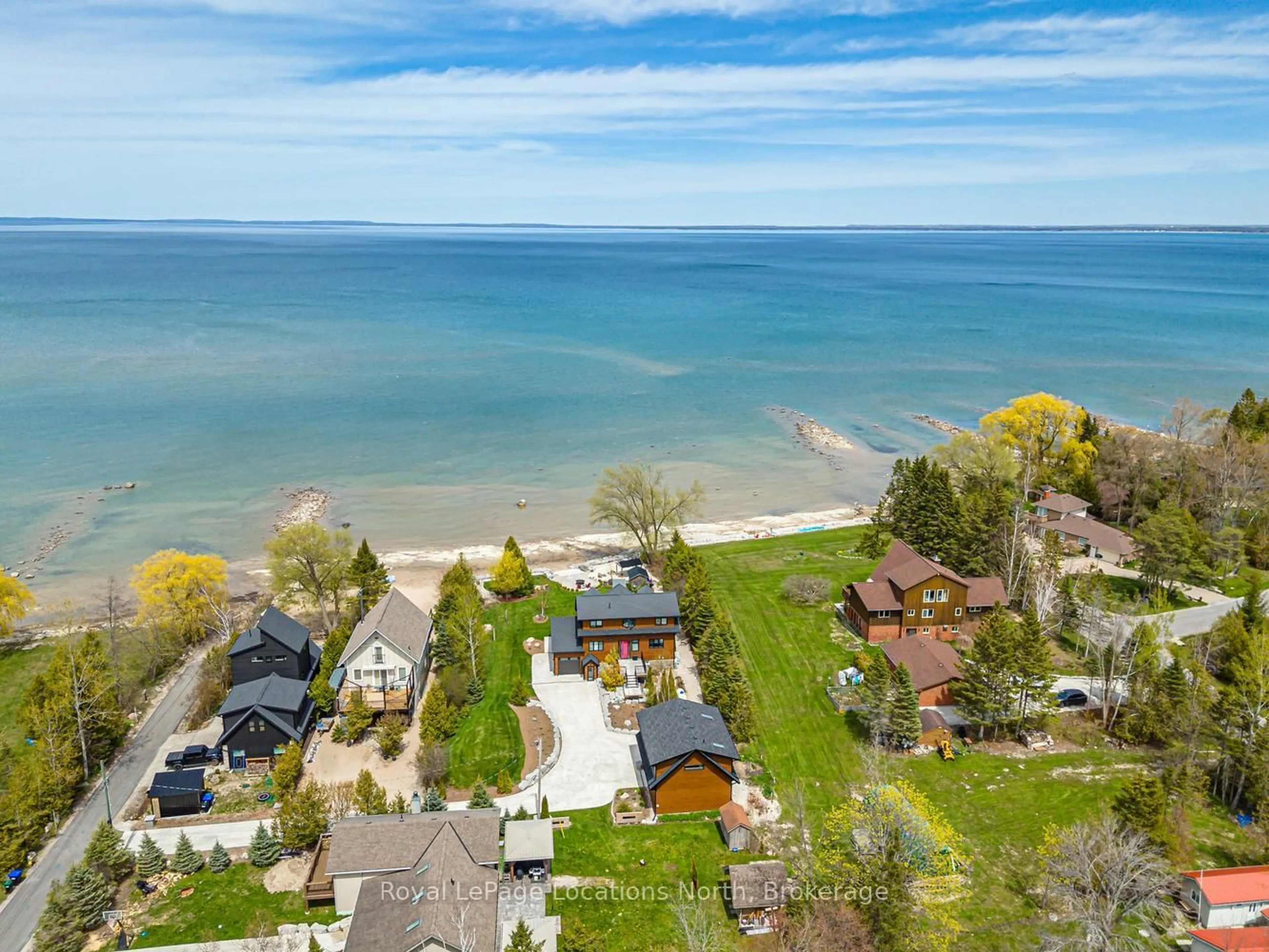 A pic from outside/outdoor area/front of a property/back of a property/a pic from drone, water/lake/river/ocean view for 33 D Lane, Collingwood Ontario L9Y 0X2