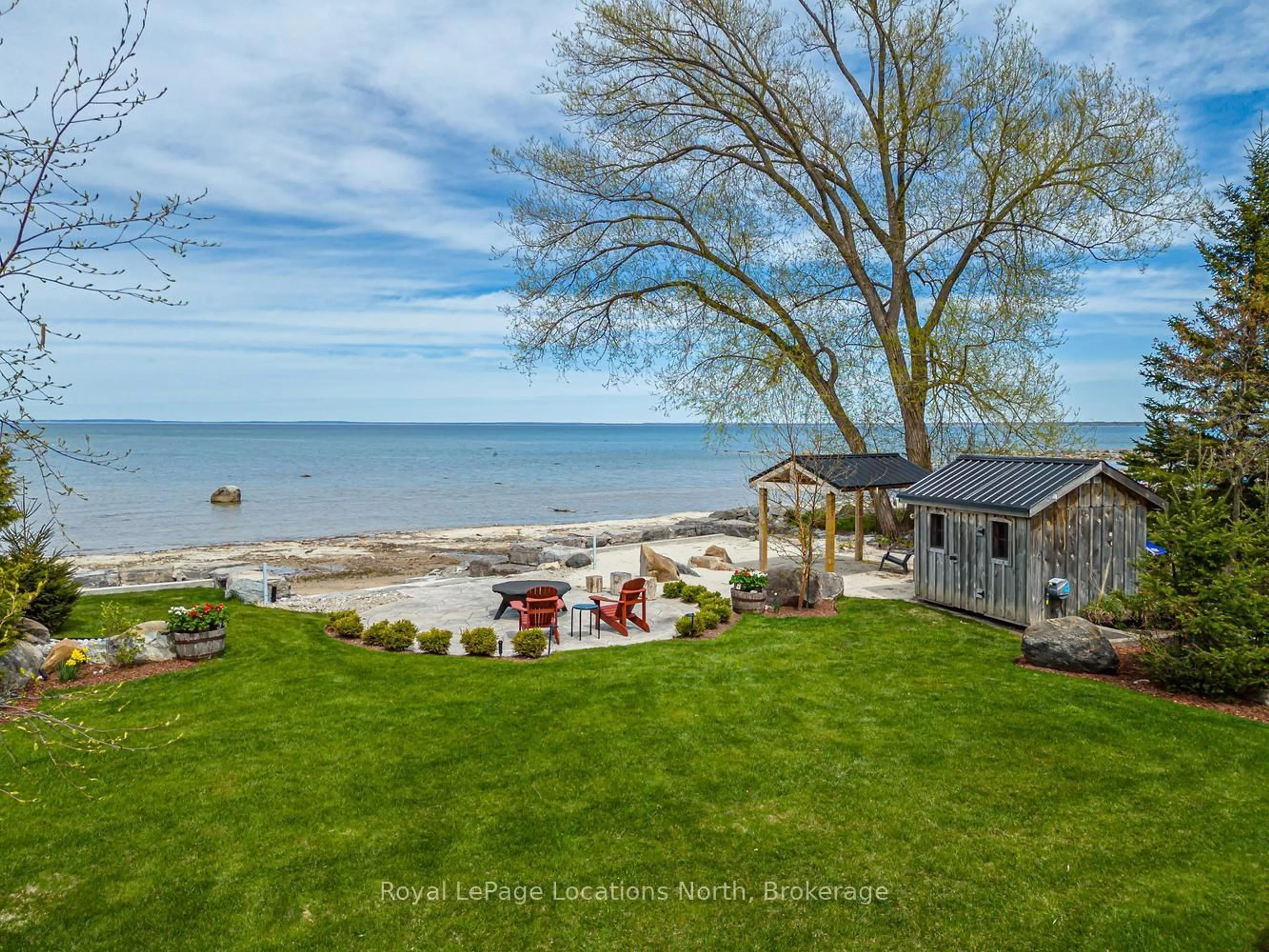 A pic from outside/outdoor area/front of a property/back of a property/a pic from drone, water/lake/river/ocean view for 33 D Lane, Collingwood Ontario L9Y 0X2