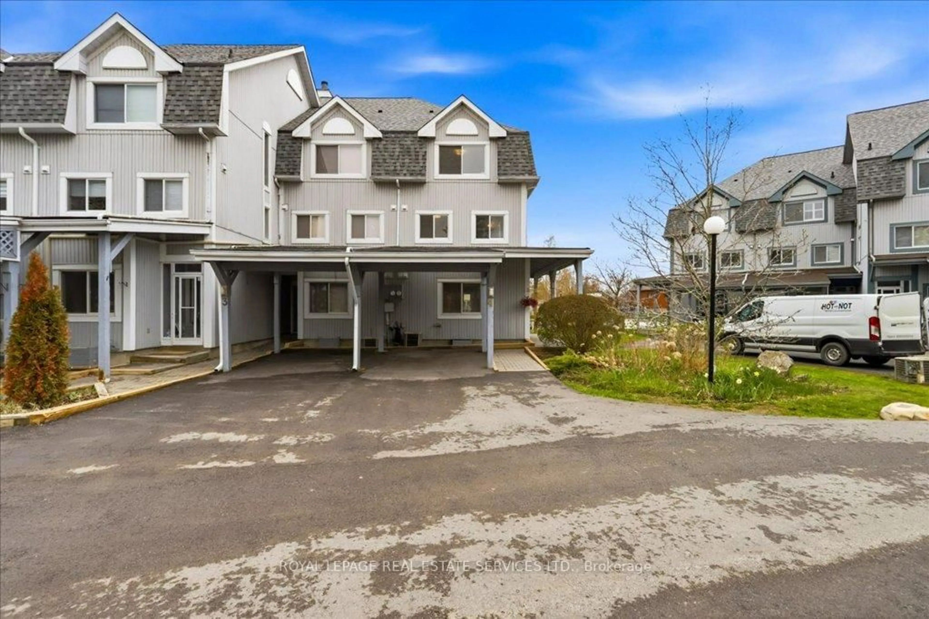 A pic from outside/outdoor area/front of a property/back of a property/a pic from drone, street for 30 Laguna Pkwy #4, Ramara Ontario L0K 1B0