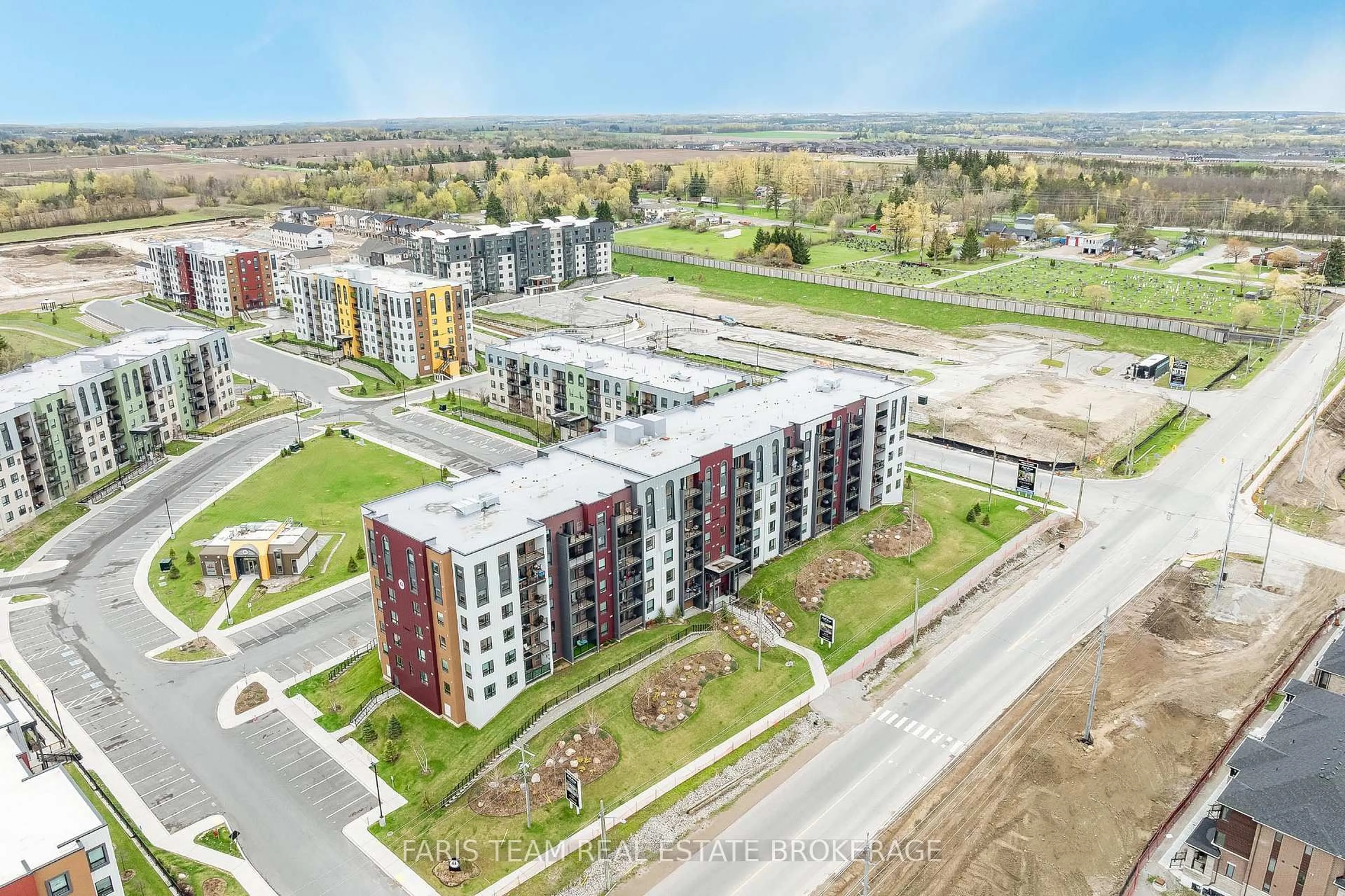 A pic from outside/outdoor area/front of a property/back of a property/a pic from drone, unknown for 4 Spice Way #402, Barrie Ontario L9J 0M2