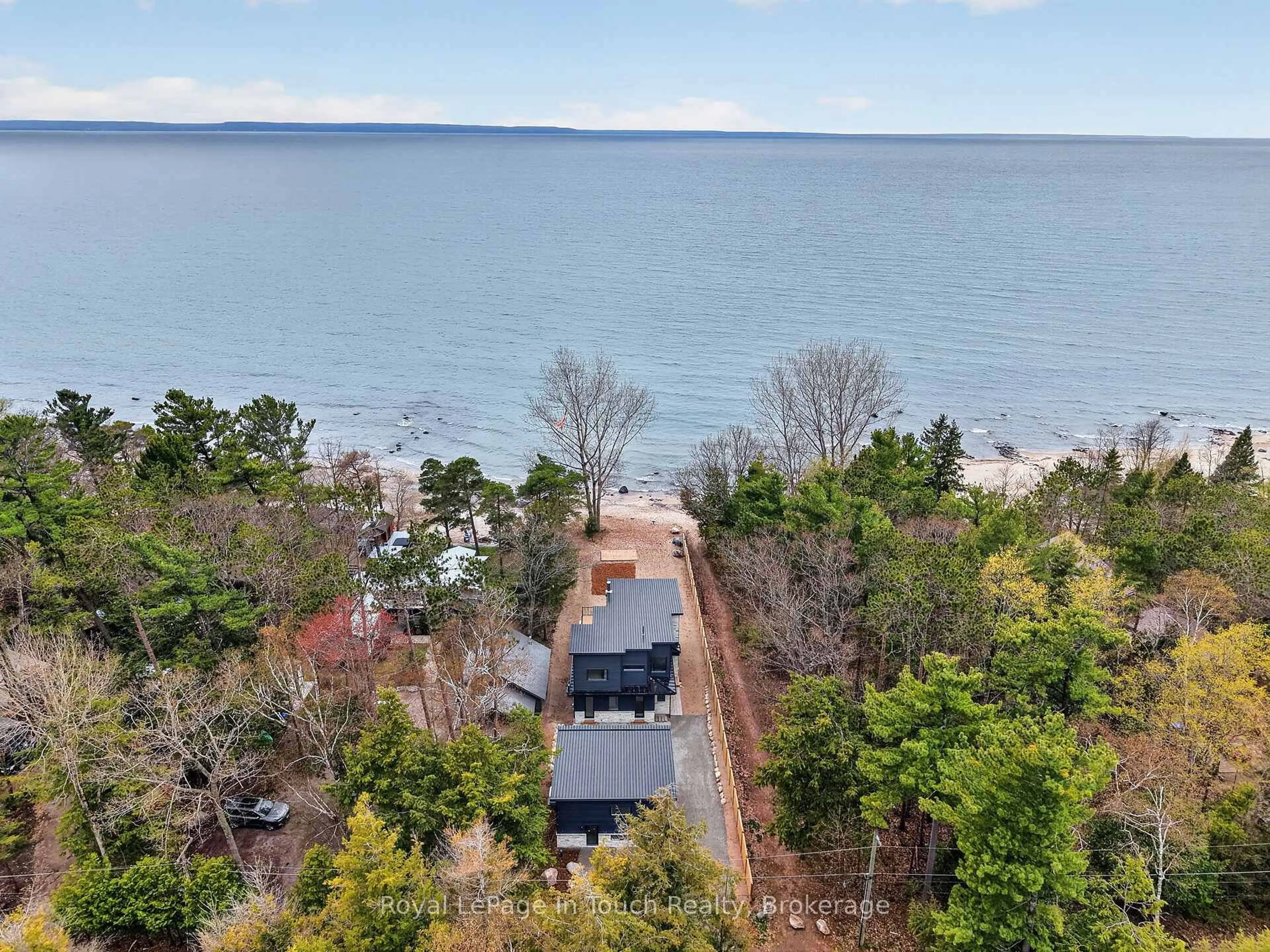 A pic from outside/outdoor area/front of a property/back of a property/a pic from drone, water/lake/river/ocean view for 160 Tiny Beaches Rd, Tiny Ontario L0L 2J0