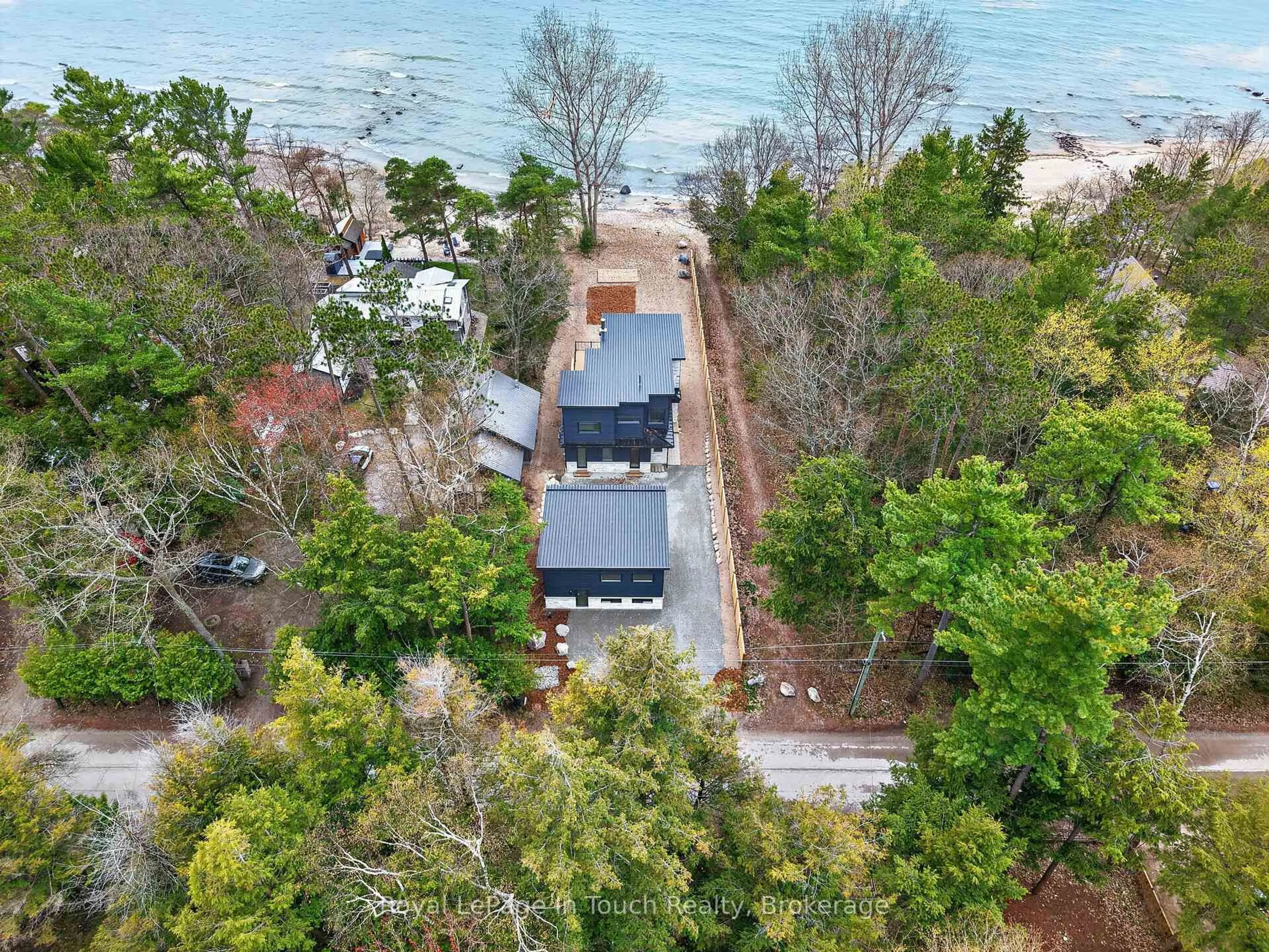 A pic from outside/outdoor area/front of a property/back of a property/a pic from drone, water/lake/river/ocean view for 160 Tiny Beaches Rd, Tiny Ontario L0L 2J0
