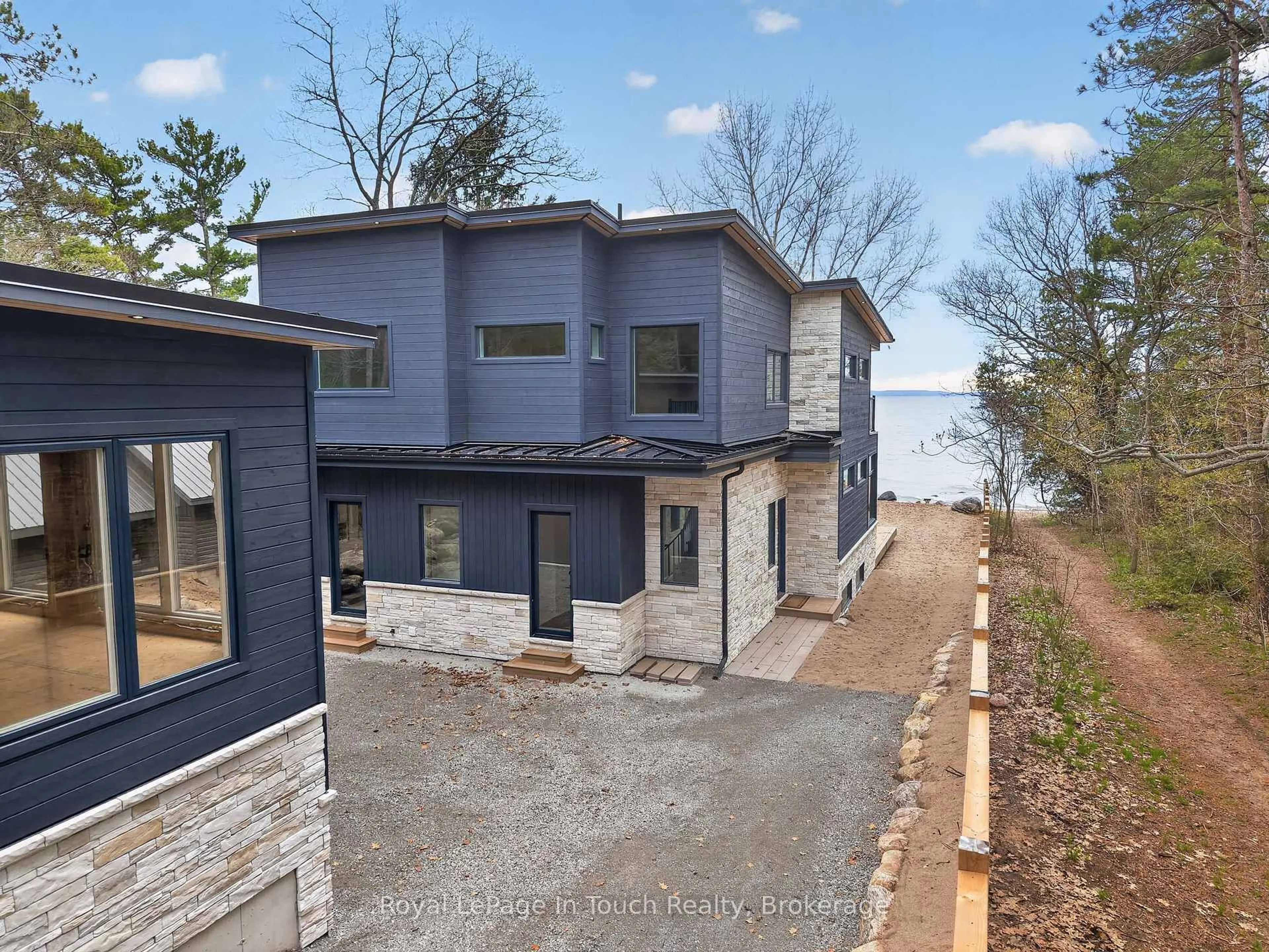 Home with brick exterior material, water/lake/river/ocean view for 160 Tiny Beaches Rd, Tiny Ontario L0L 2J0