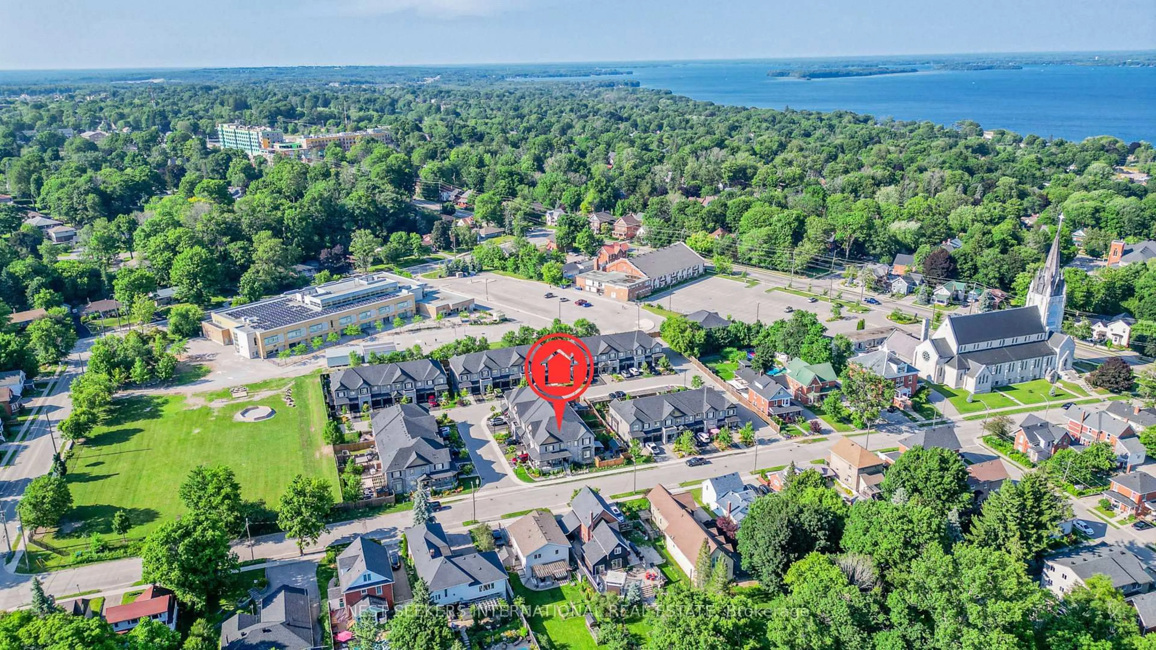 A pic from outside/outdoor area/front of a property/back of a property/a pic from drone, water/lake/river/ocean view for 2 Forest Heights Cres, Orillia Ontario L3V 8J6