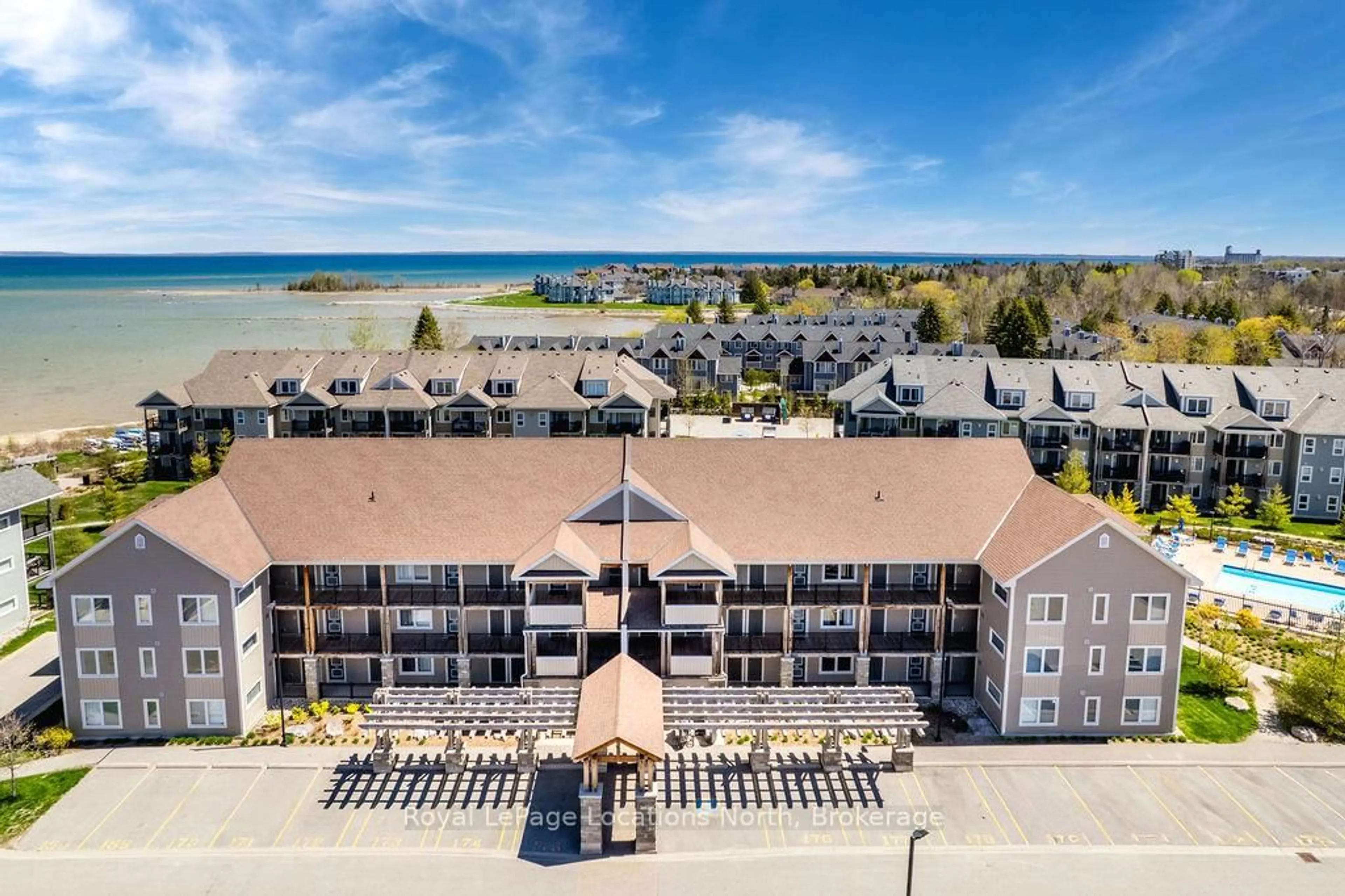 A pic from outside/outdoor area/front of a property/back of a property/a pic from drone, water/lake/river/ocean view for 5 Anchorage Cres #201, Collingwood Ontario L9Y 0Y6