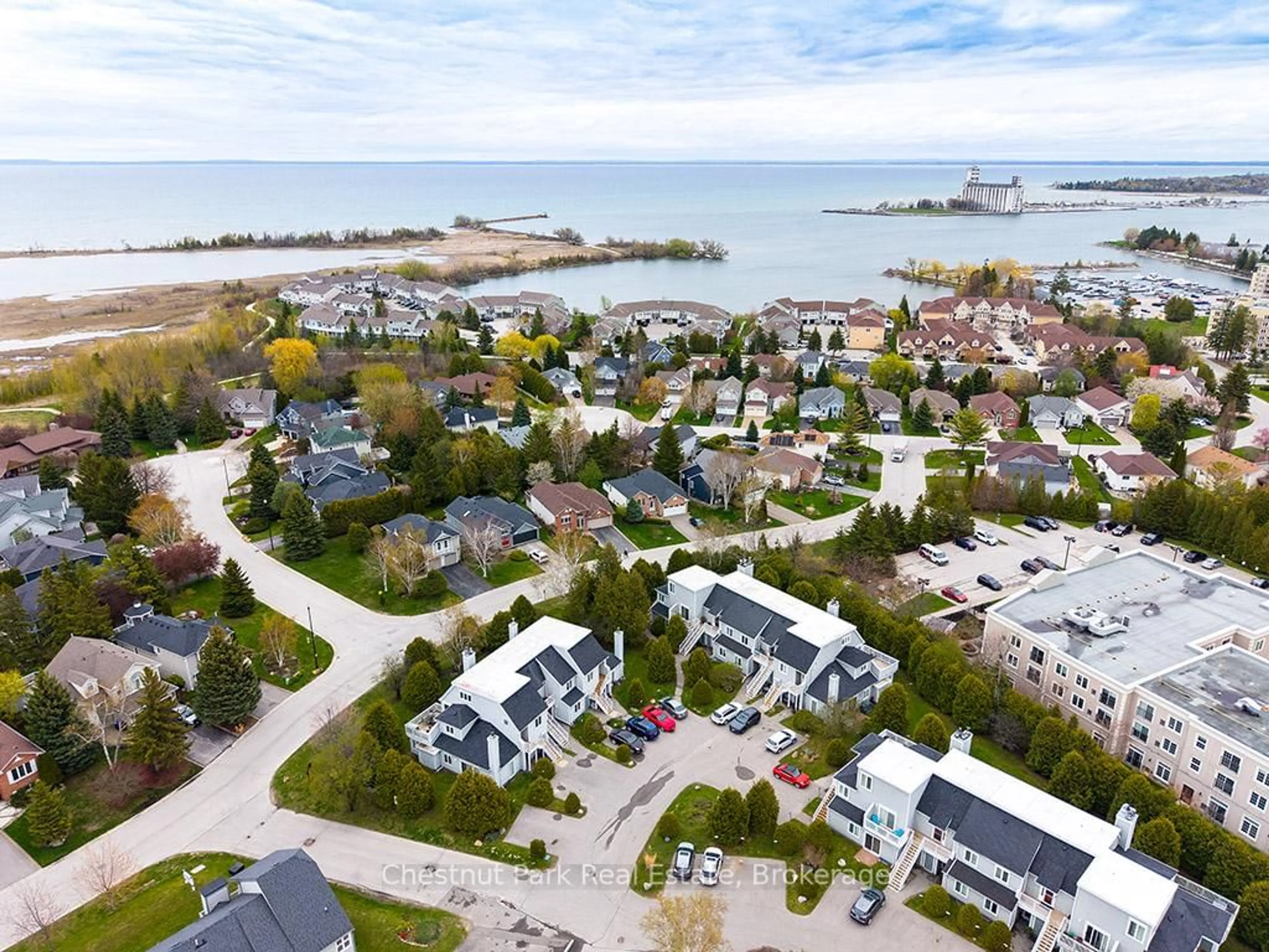 A pic from outside/outdoor area/front of a property/back of a property/a pic from drone, water/lake/river/ocean view for 55 Trott Blvd #114, Collingwood Ontario L9Y 5B8