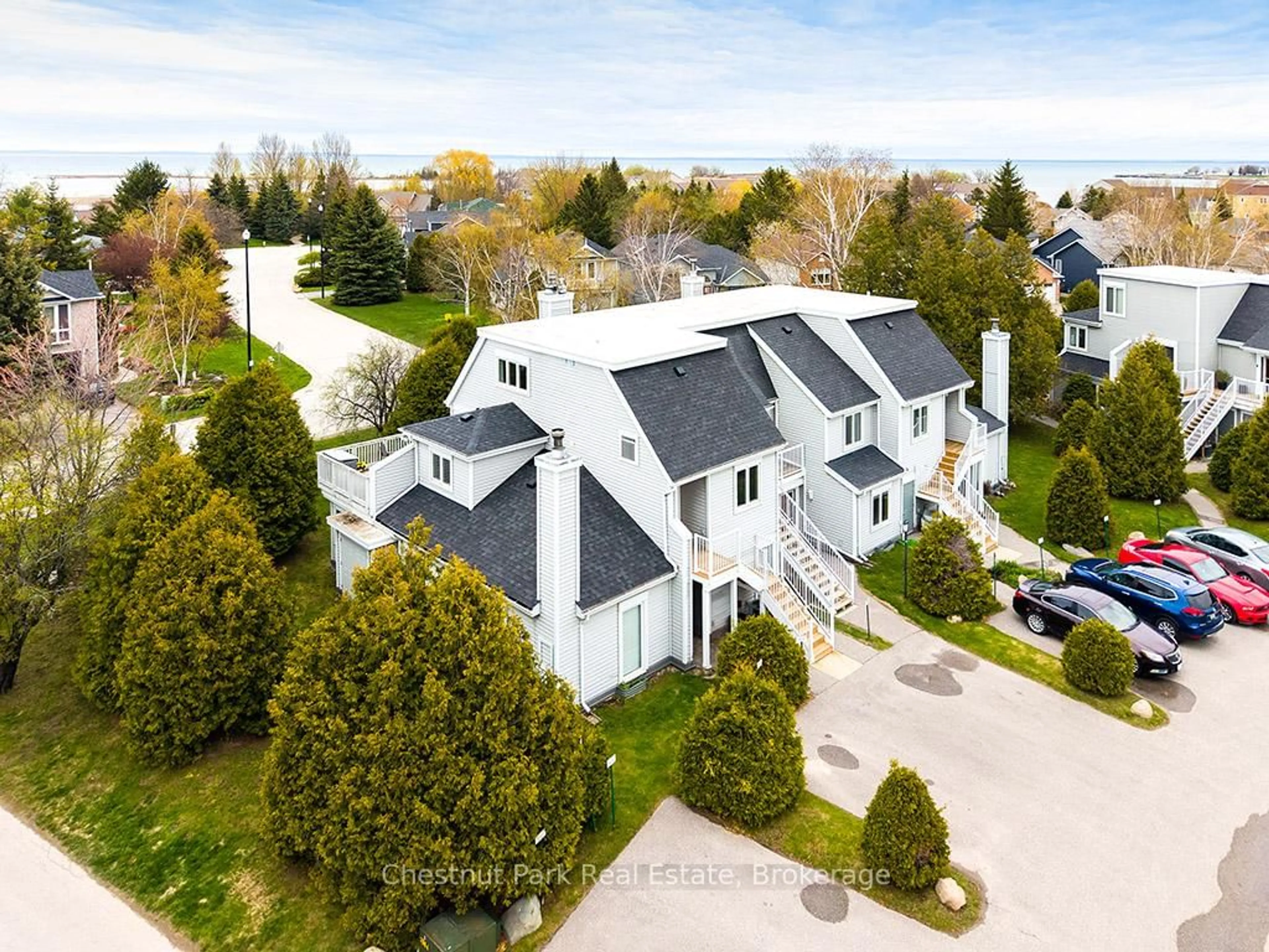 A pic from outside/outdoor area/front of a property/back of a property/a pic from drone, street for 55 Trott Blvd #114, Collingwood Ontario L9Y 5B8