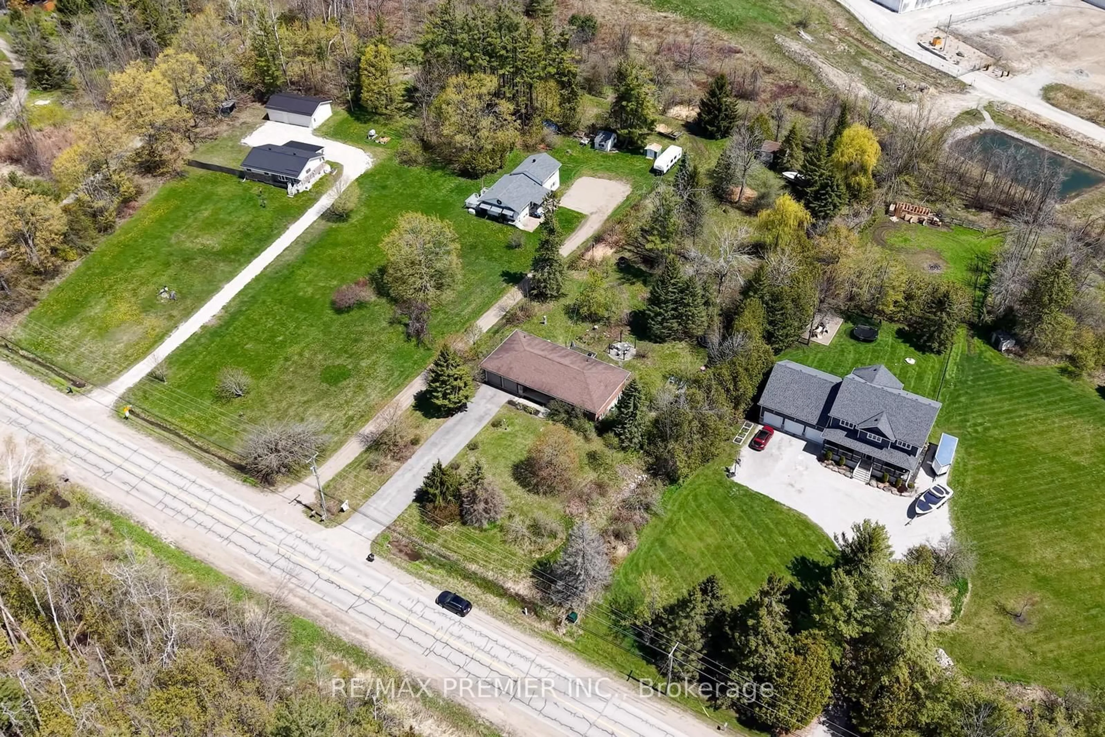 A pic from outside/outdoor area/front of a property/back of a property/a pic from drone, street for 771 Line 7, Oro-Medonte Ontario L0L 2E0