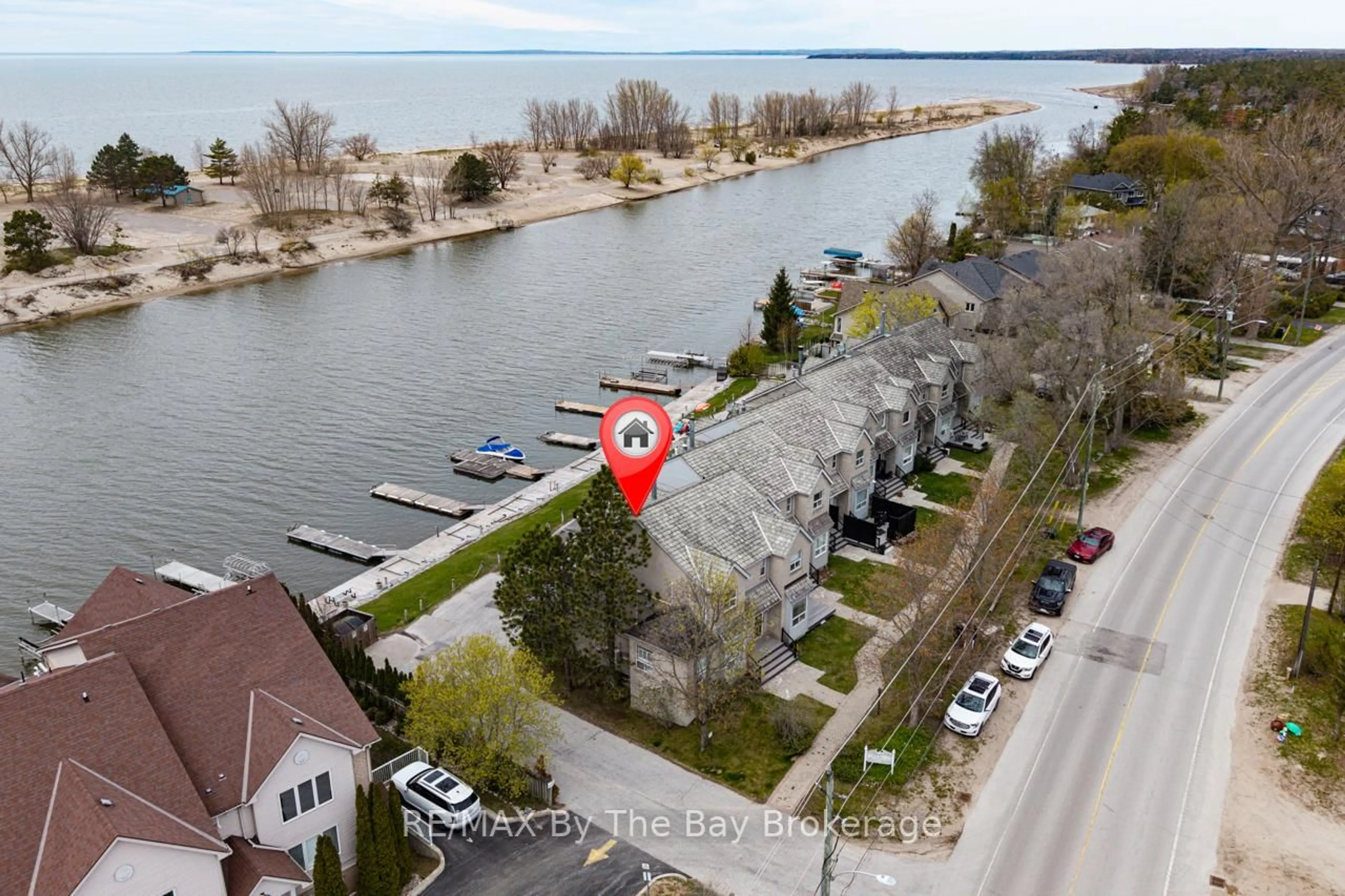 A pic from outside/outdoor area/front of a property/back of a property/a pic from drone, water/lake/river/ocean view for 216 River Rd #1, Wasaga Beach Ontario L9Z 2L6