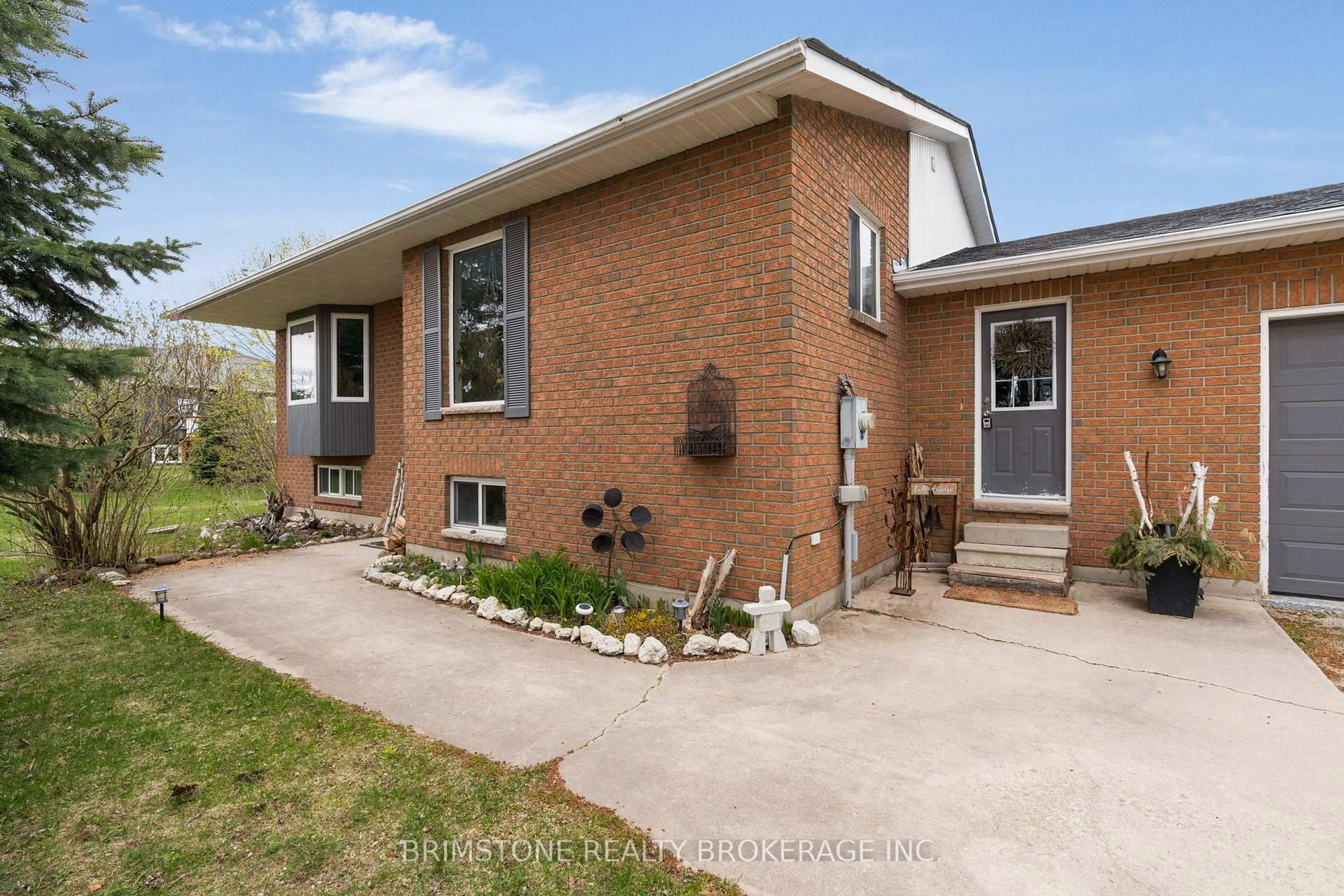 Home with brick exterior material, street for 220 Morgan Rd, Wasaga Beach Ontario L9Z 1N4