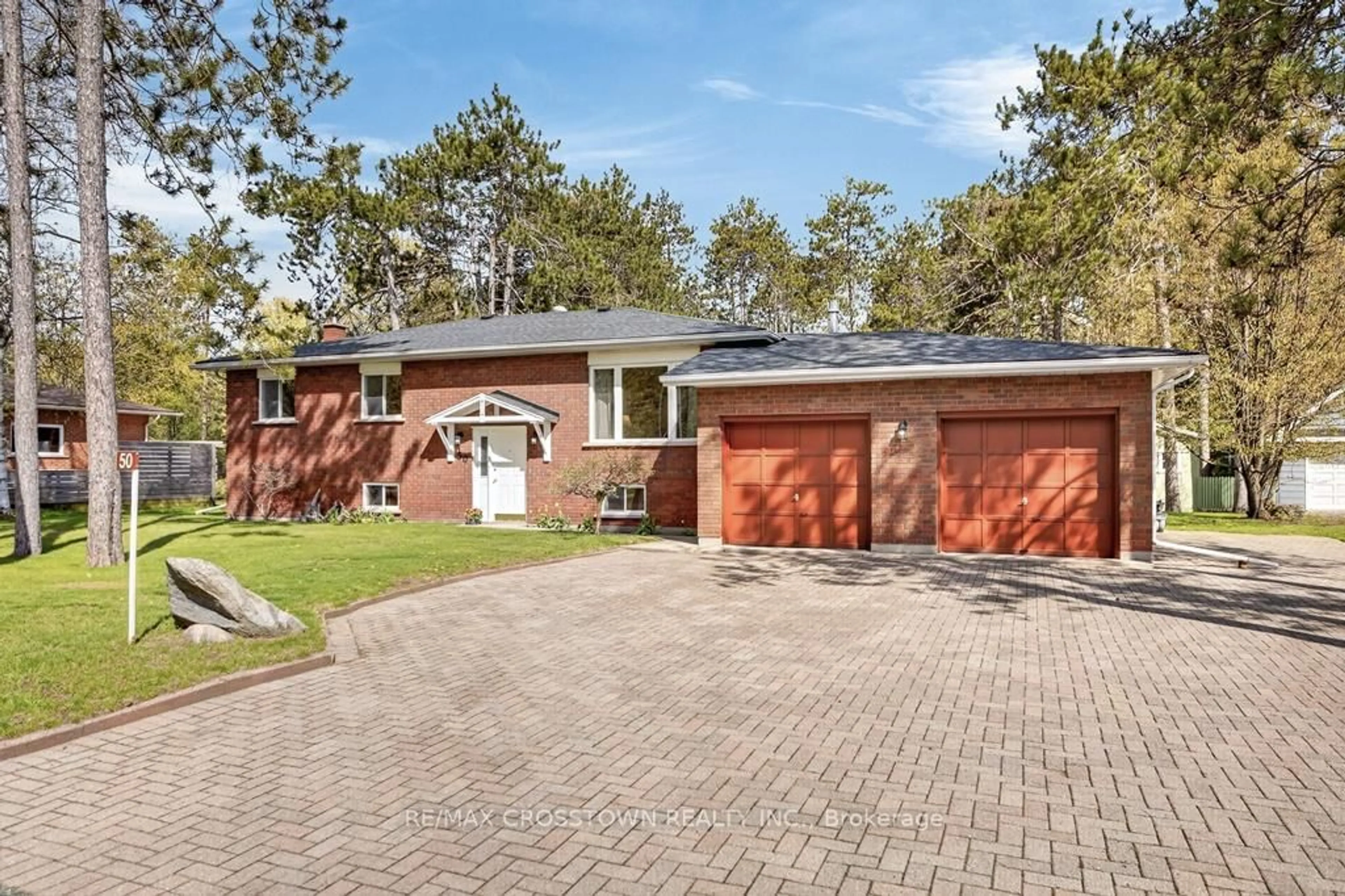 Home with brick exterior material, street for 50 Withall Grve, Tiny Ontario L0L 2T0