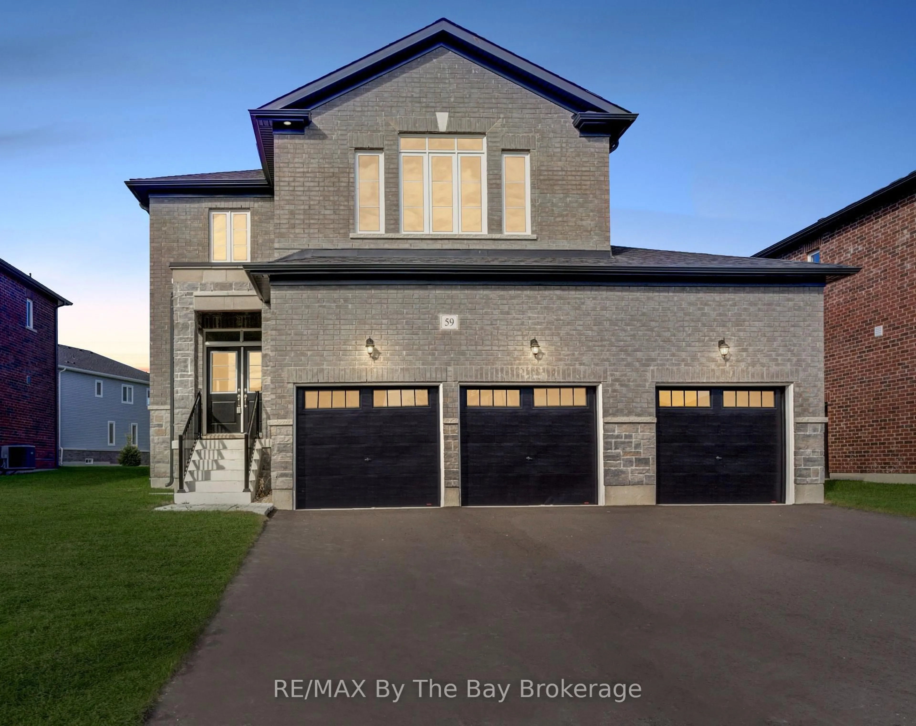 Home with brick exterior material, street for 59 Amber Dr, Wasaga Beach Ontario L9Z 0R8