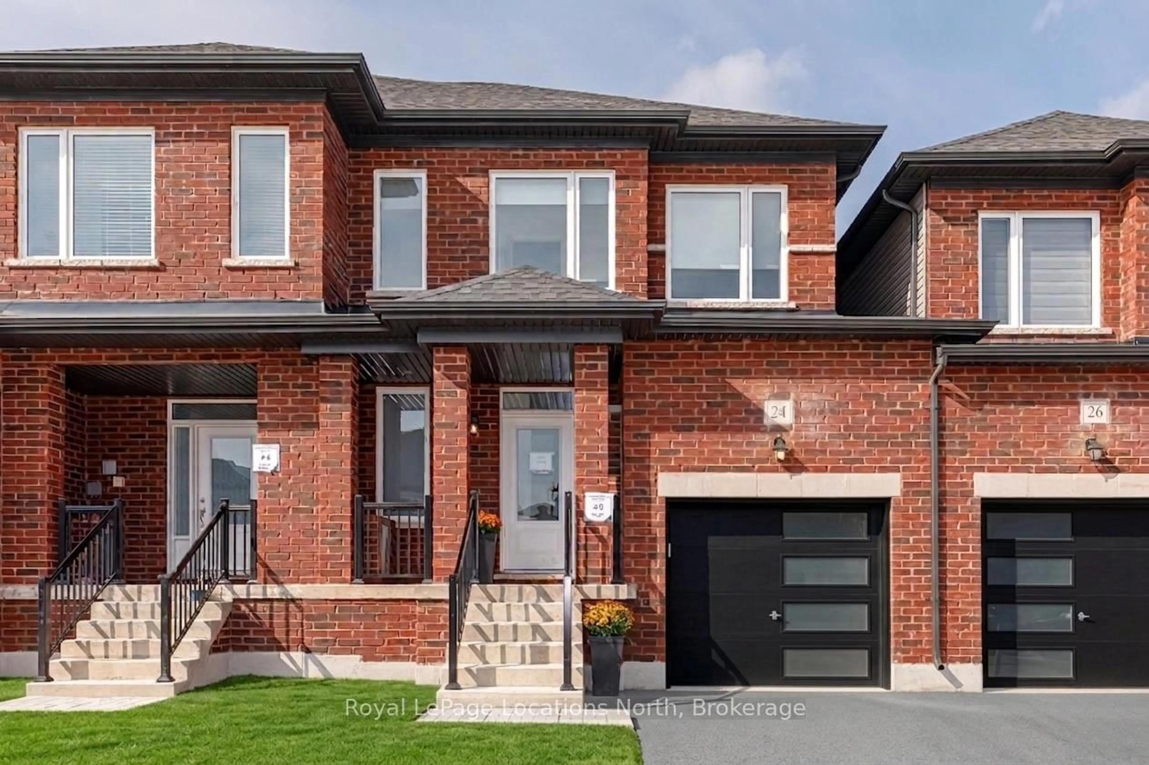 Home with brick exterior material, street for 24 LISA St, Wasaga Beach Ontario L9Y 0K8