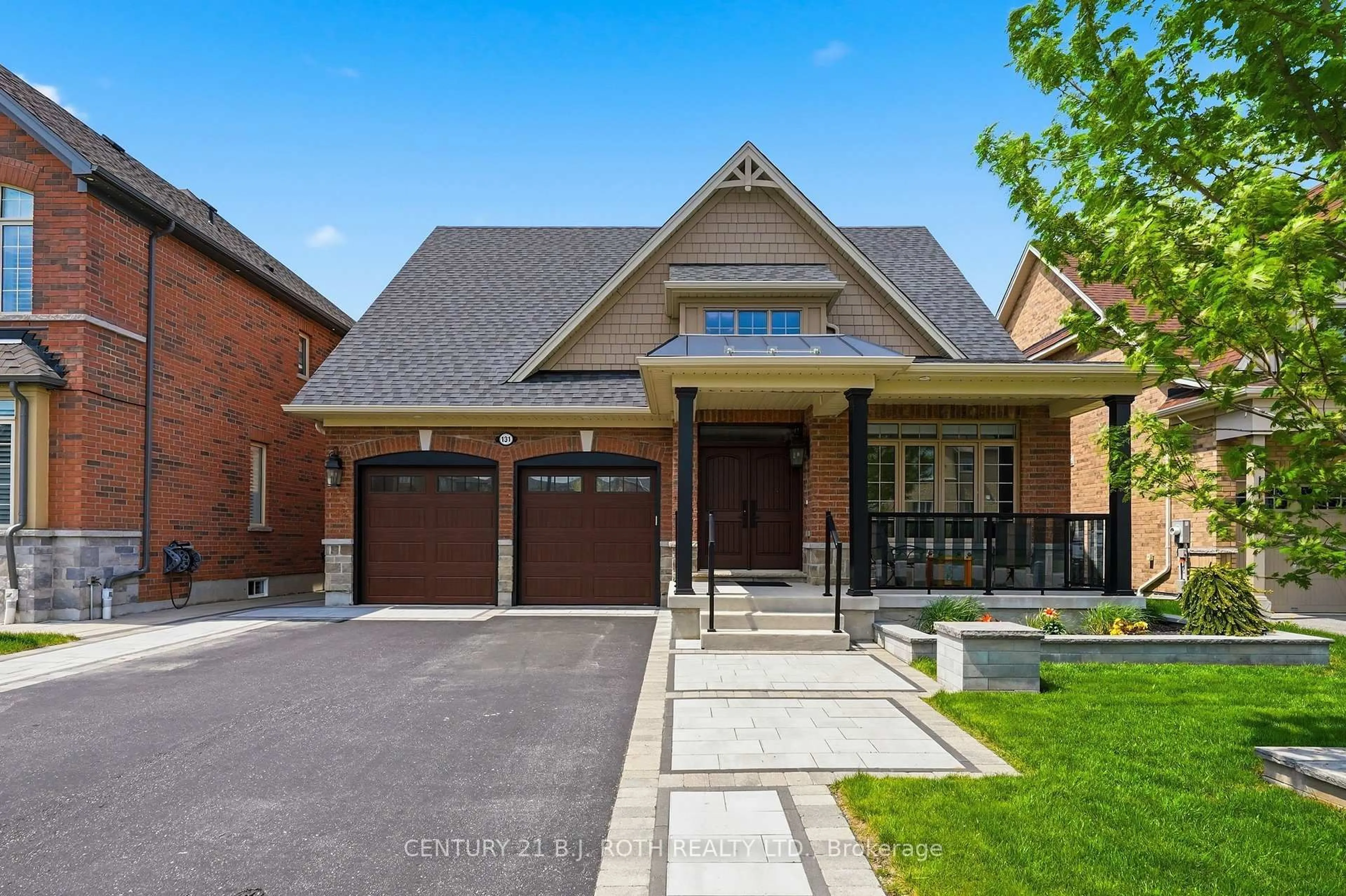 Home with brick exterior material, street for 131 Trail Blvd, Springwater Ontario L9X 0S7