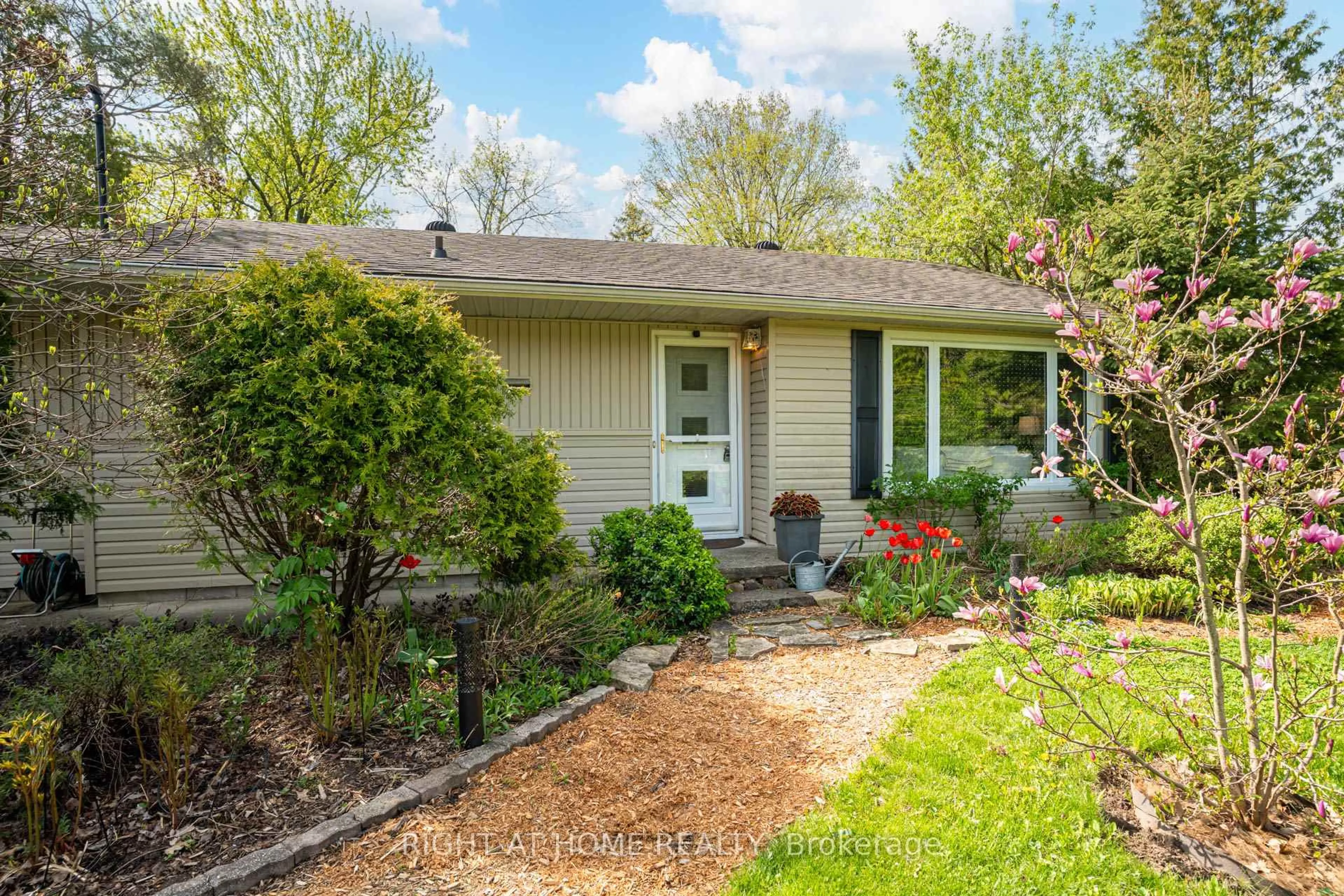 Home with vinyl exterior material, street for 15 Wattie Rd, Springwater Ontario L9X 0P8