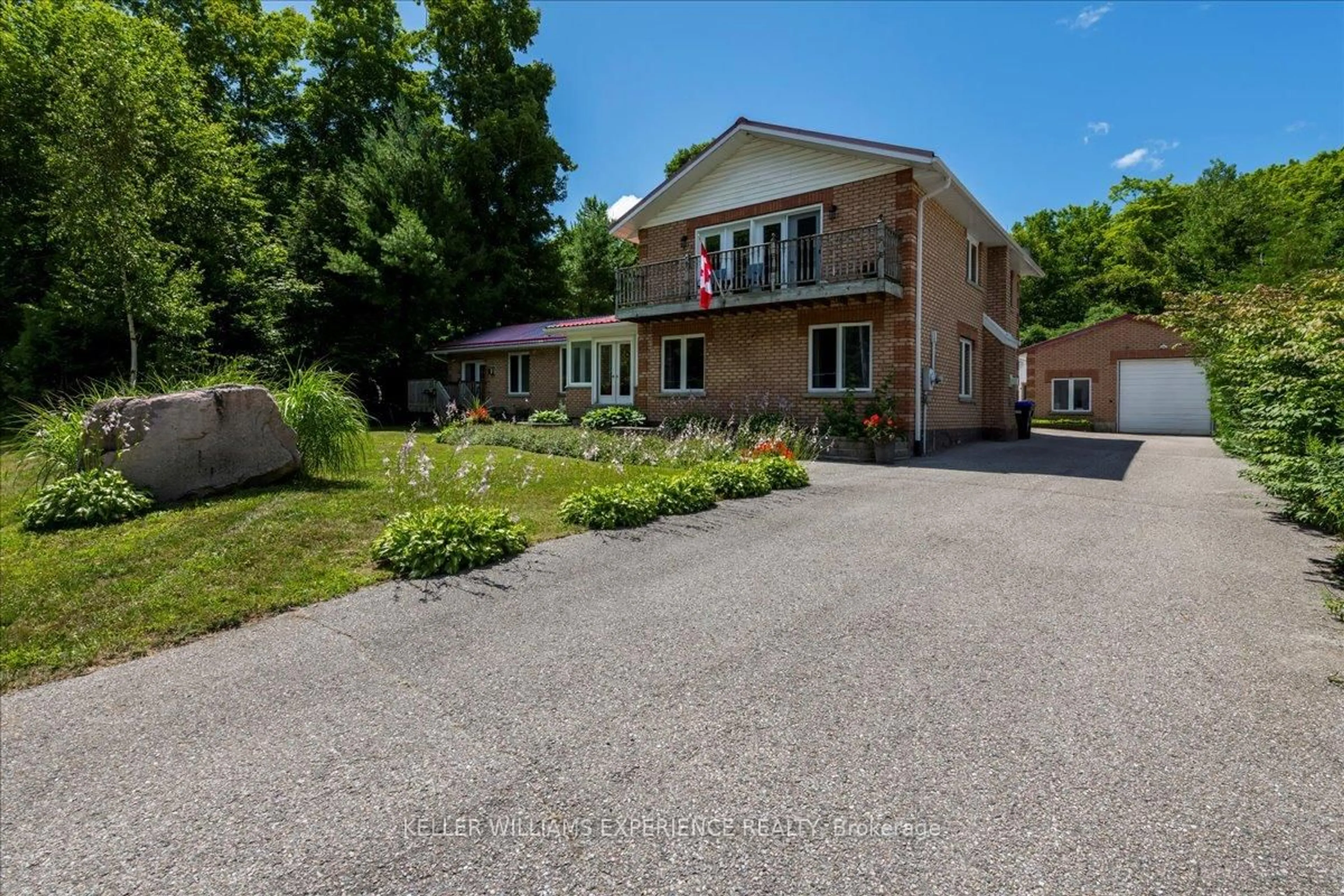 A pic from outside/outdoor area/front of a property/back of a property/a pic from drone, street for 1512 Champlain Rd, Tiny Ontario L9M 0C1
