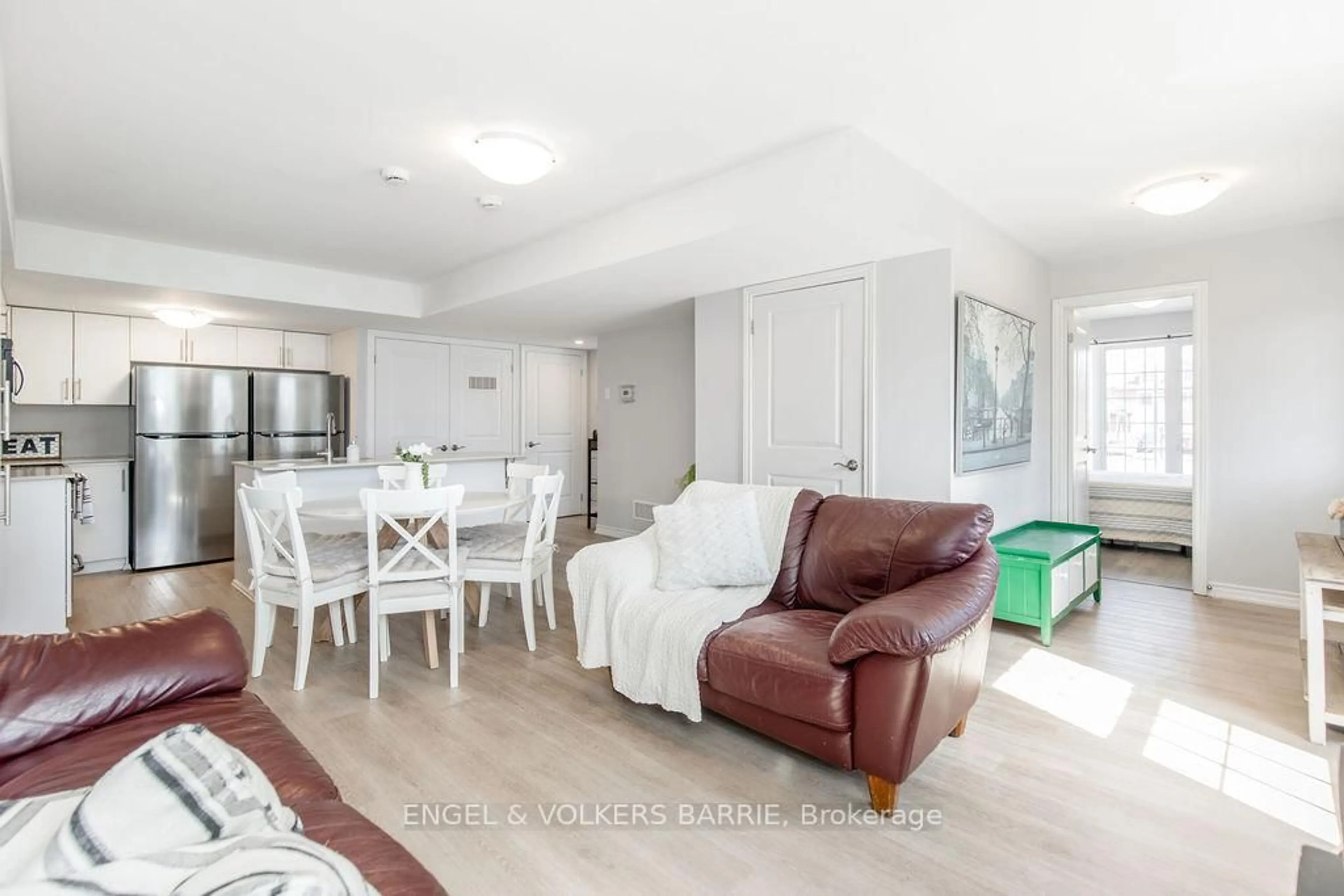 Living room with furniture, unknown for 242 Penetanguishene Rd #16, Barrie Ontario L4M 7C2