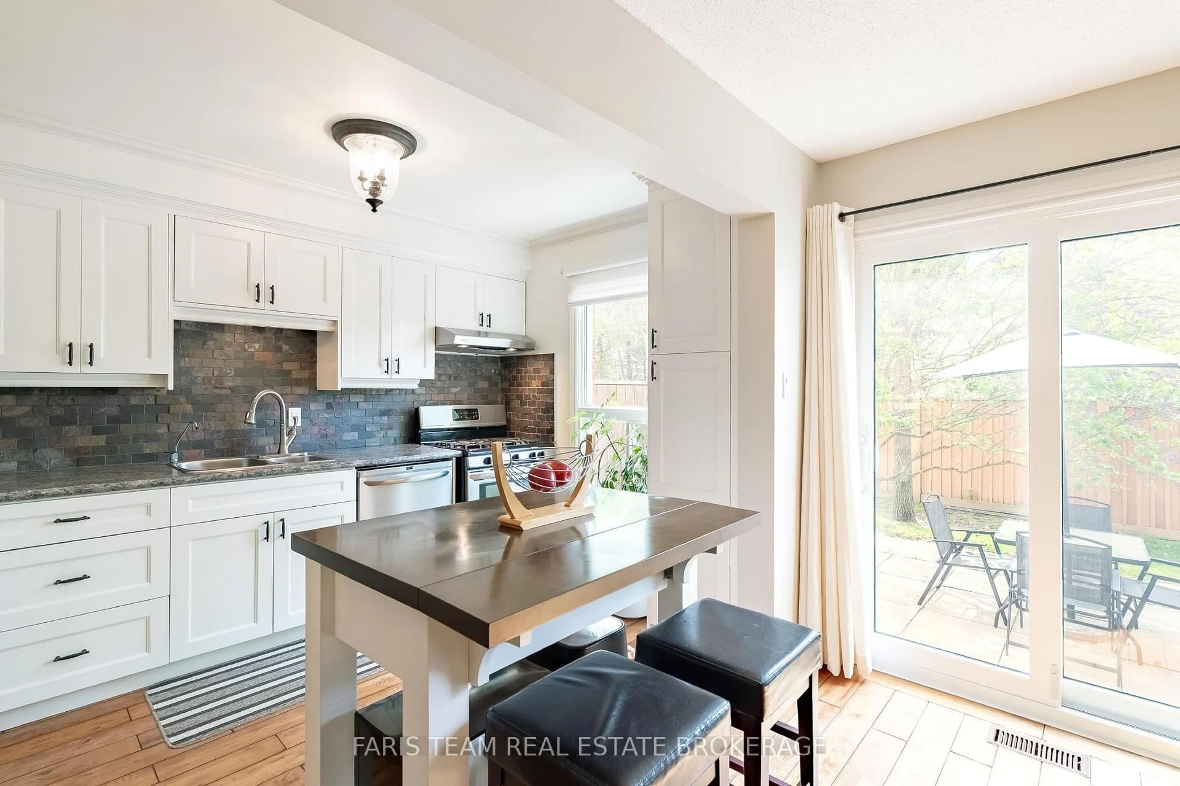 Open concept kitchen, ceramic/tile floor for 165 Kozlov St #64, Barrie Ontario L4N 7M7