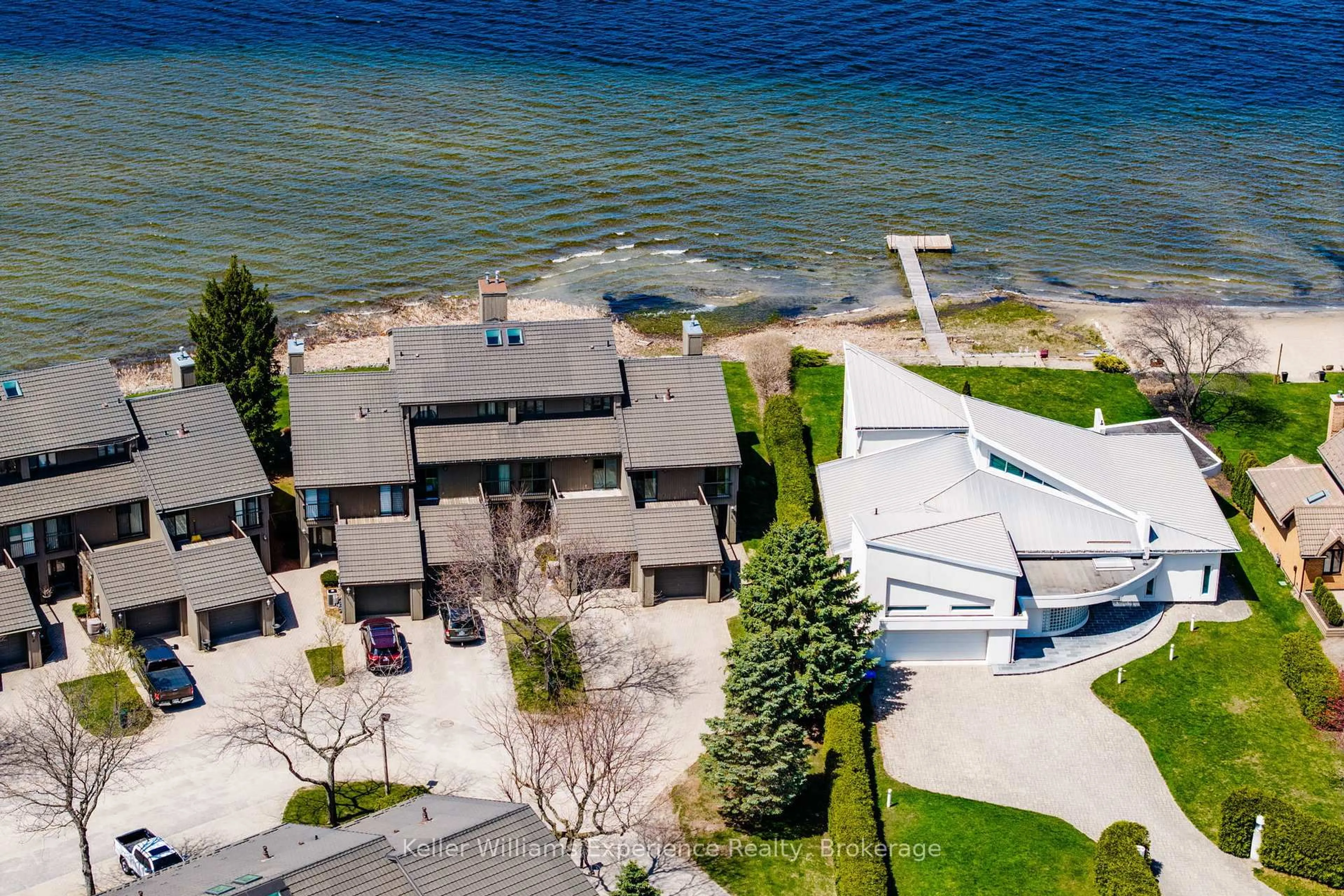 A pic from outside/outdoor area/front of a property/back of a property/a pic from drone, water/lake/river/ocean view for 8 Beck Blvd #5, Penetanguishene Ontario L9M 1C3