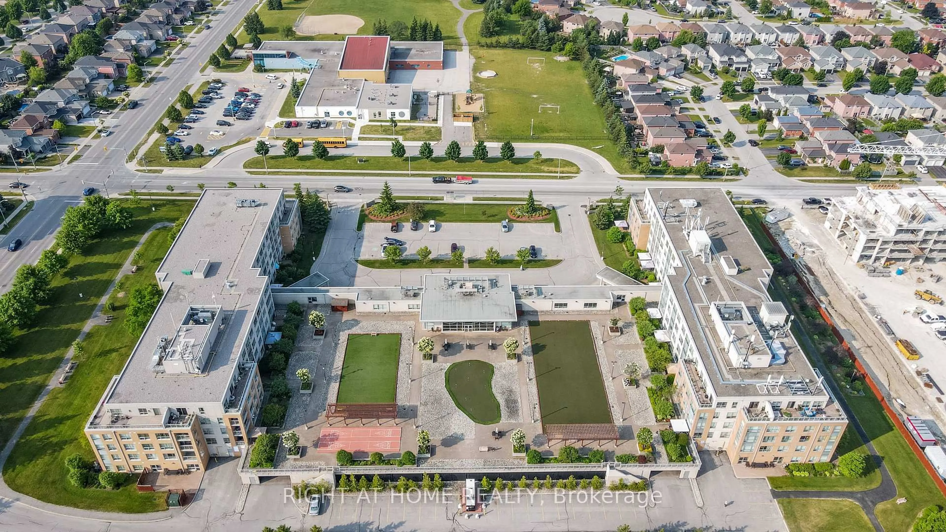 A pic from outside/outdoor area/front of a property/back of a property/a pic from drone, street for 90 Dean Ave #310, Barrie Ontario L4N 0M3