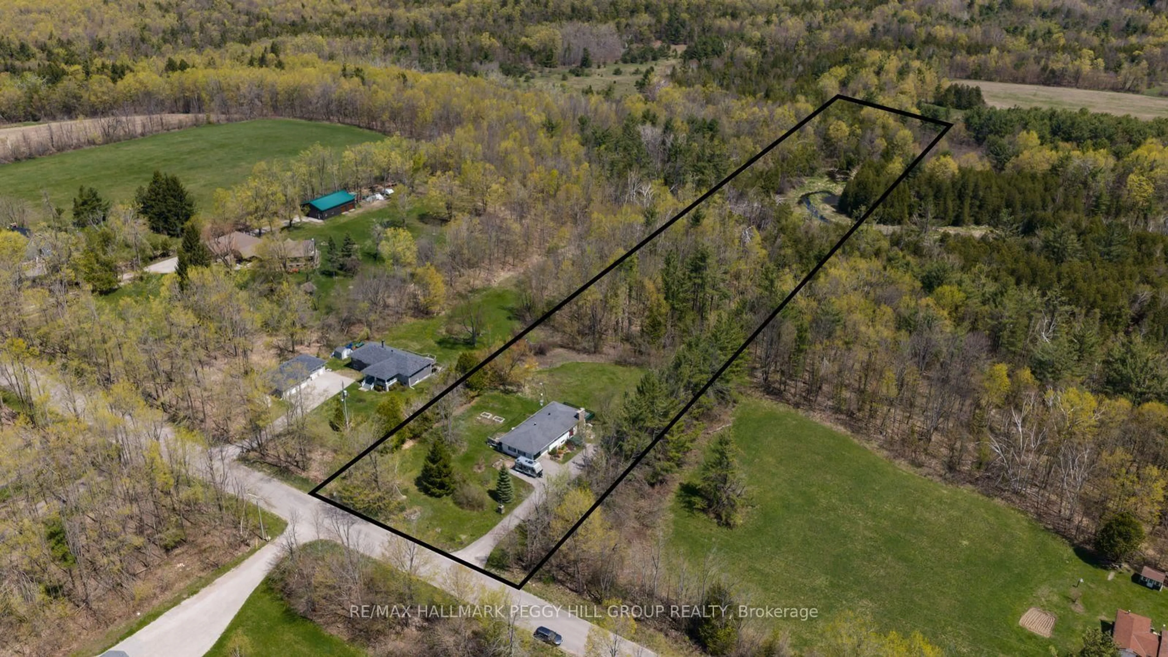 A pic from outside/outdoor area/front of a property/back of a property/a pic from drone, street for 715 13 Line, Oro-Medonte Ontario L0L 1T0
