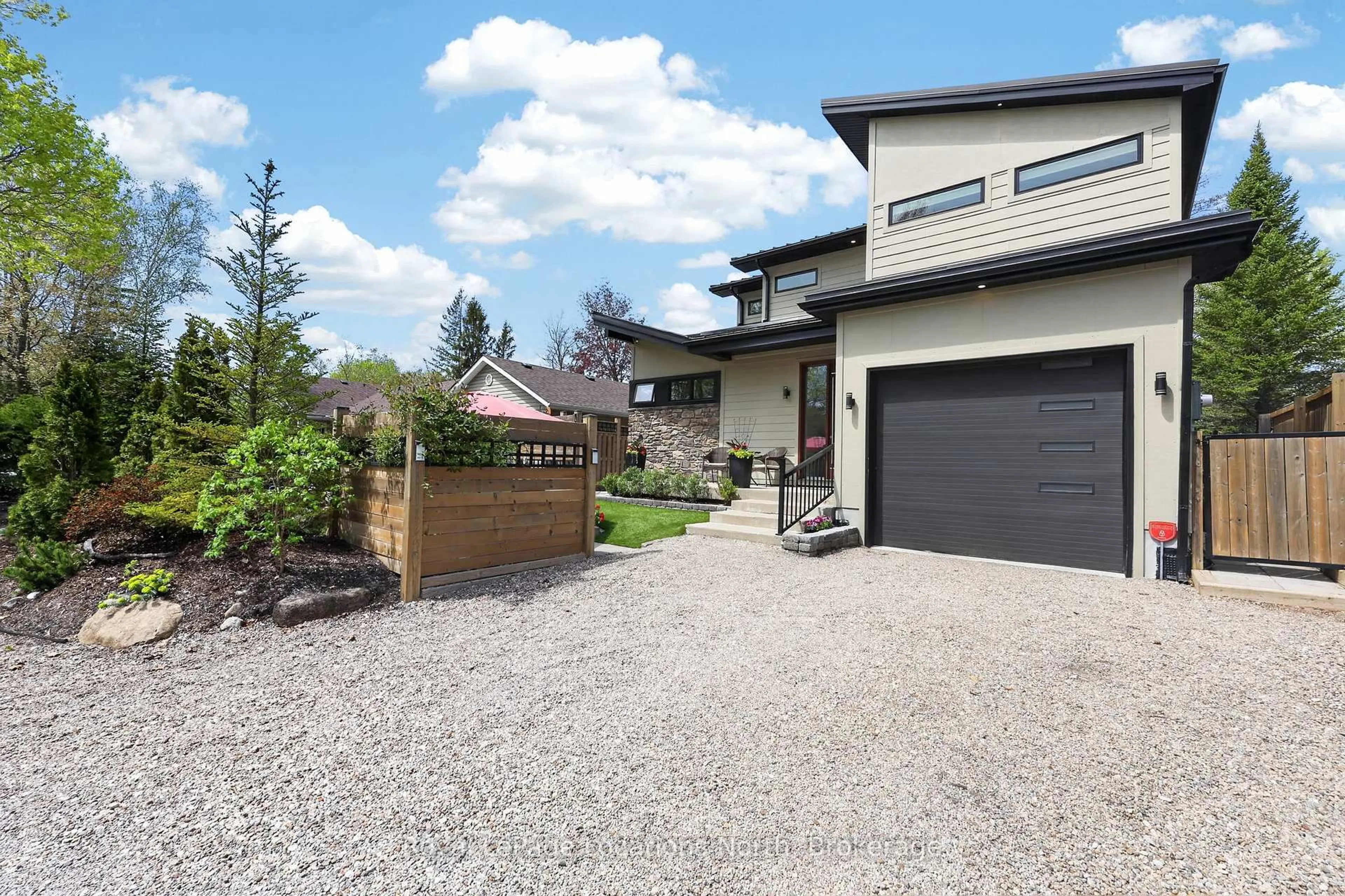 A pic from outside/outdoor area/front of a property/back of a property/a pic from drone, street for 2206 Tiny Beaches Rd, Tiny Ontario L0L 1P1