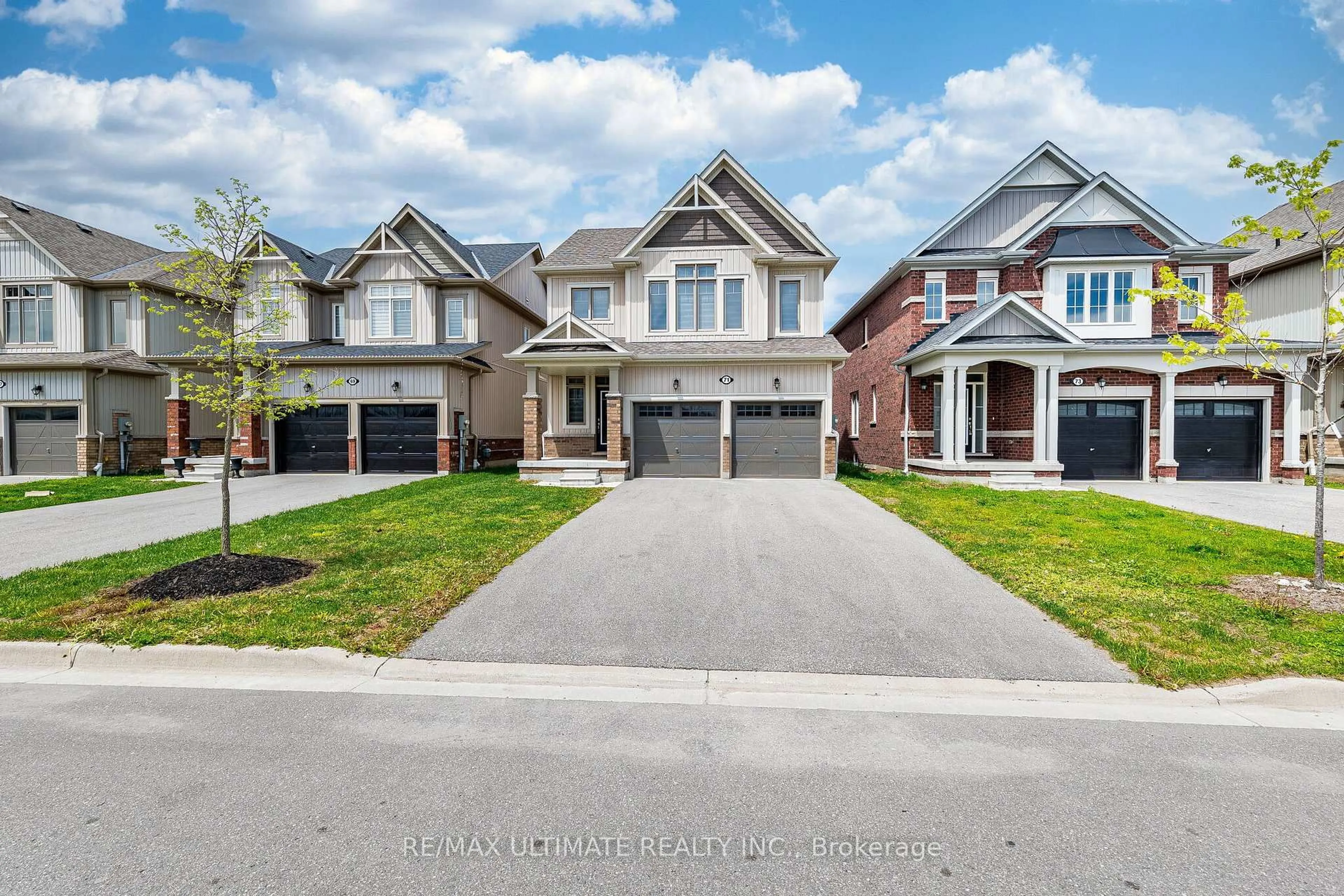 Home with brick exterior material, street for 71 Tracey Lane, Collingwood Ontario L9Y 3V2
