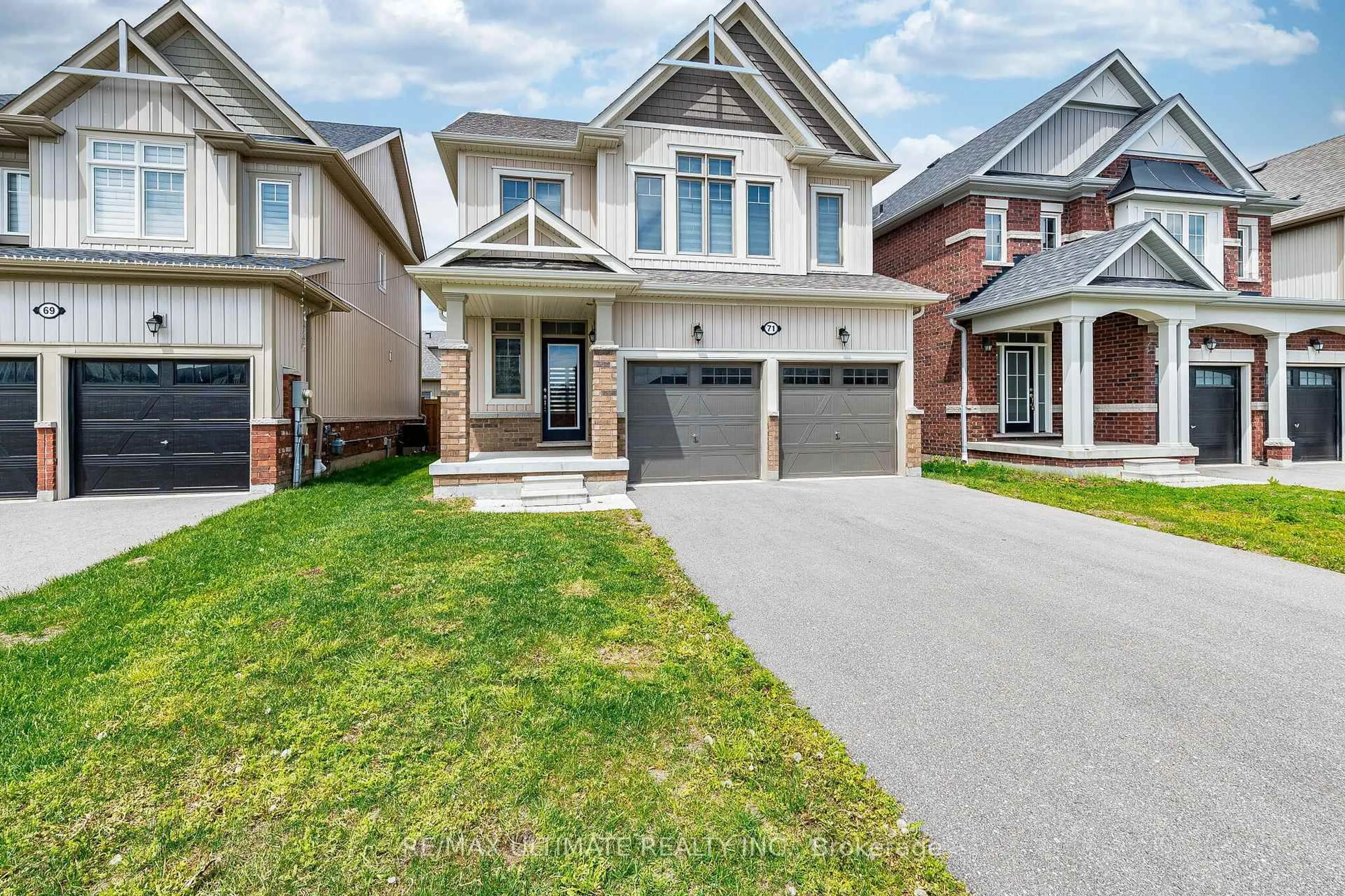 Home with brick exterior material, street for 71 Tracey Lane, Collingwood Ontario L9Y 3V2