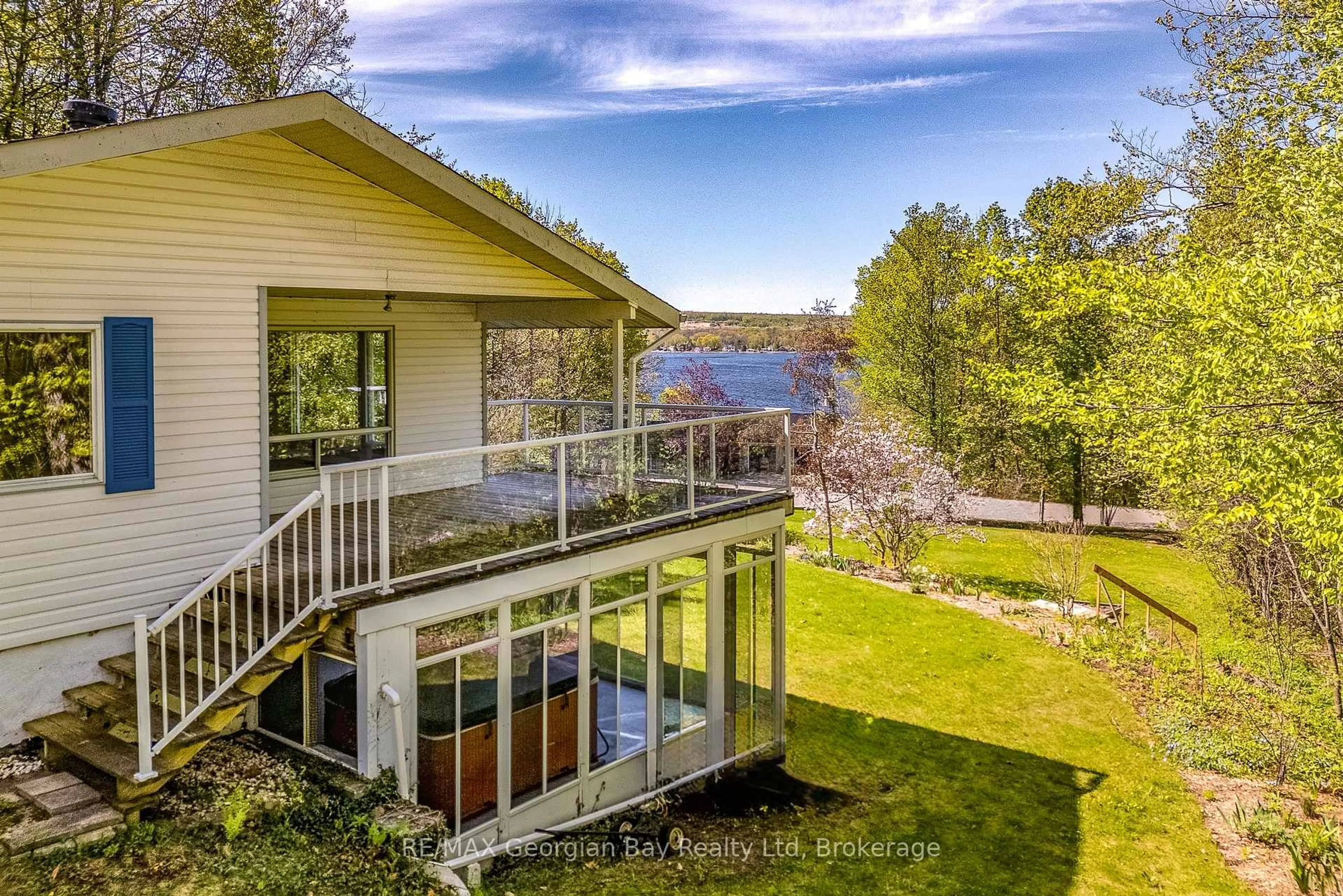 A pic from outside/outdoor area/front of a property/back of a property/a pic from drone, water/lake/river/ocean view for 125 Gilwood Park Dr, Penetanguishene Ontario L9M 1Z1